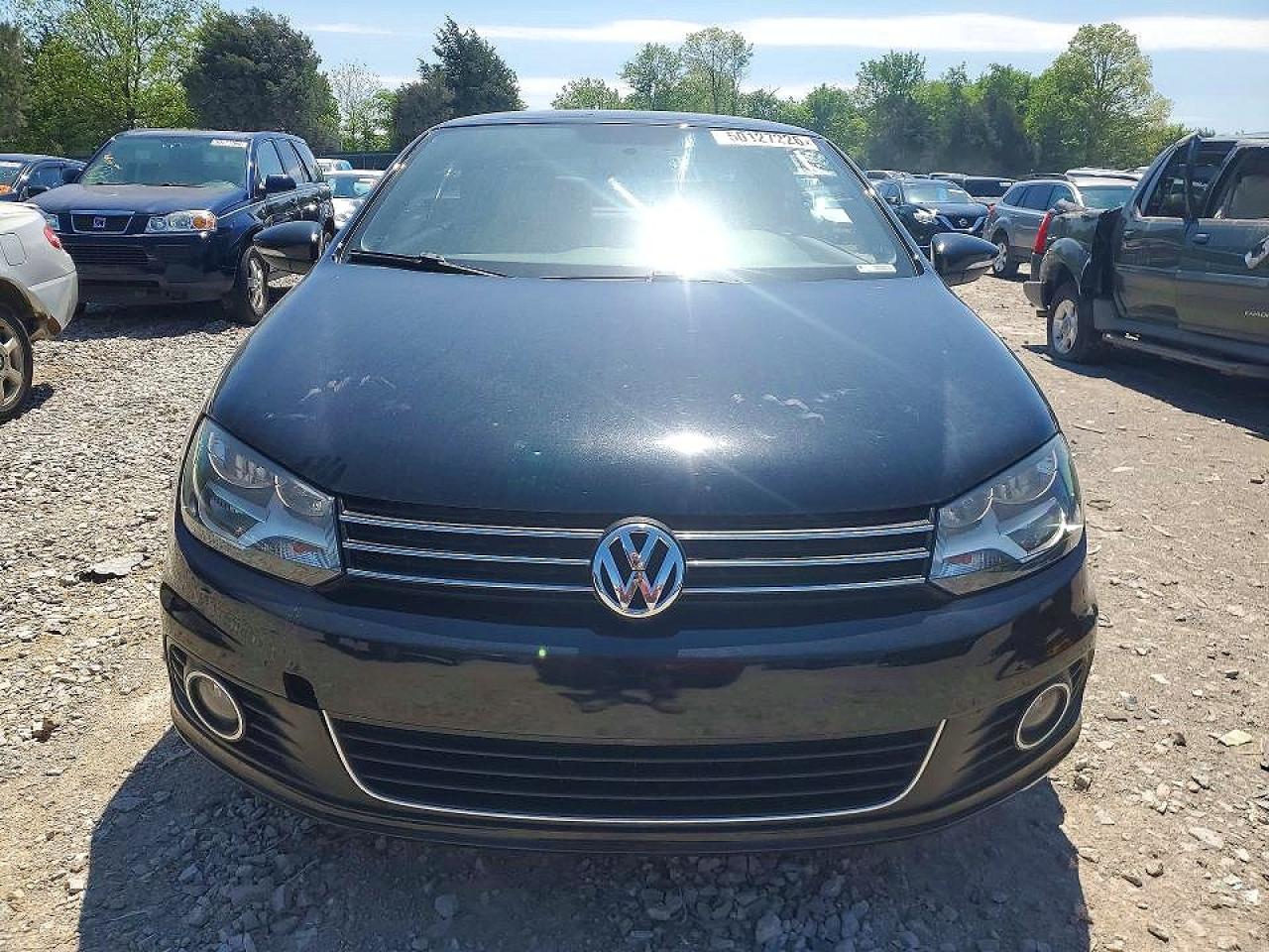 2012 Volkswagen Eos Komfort Black vin: WVWBW7AH8CV005362