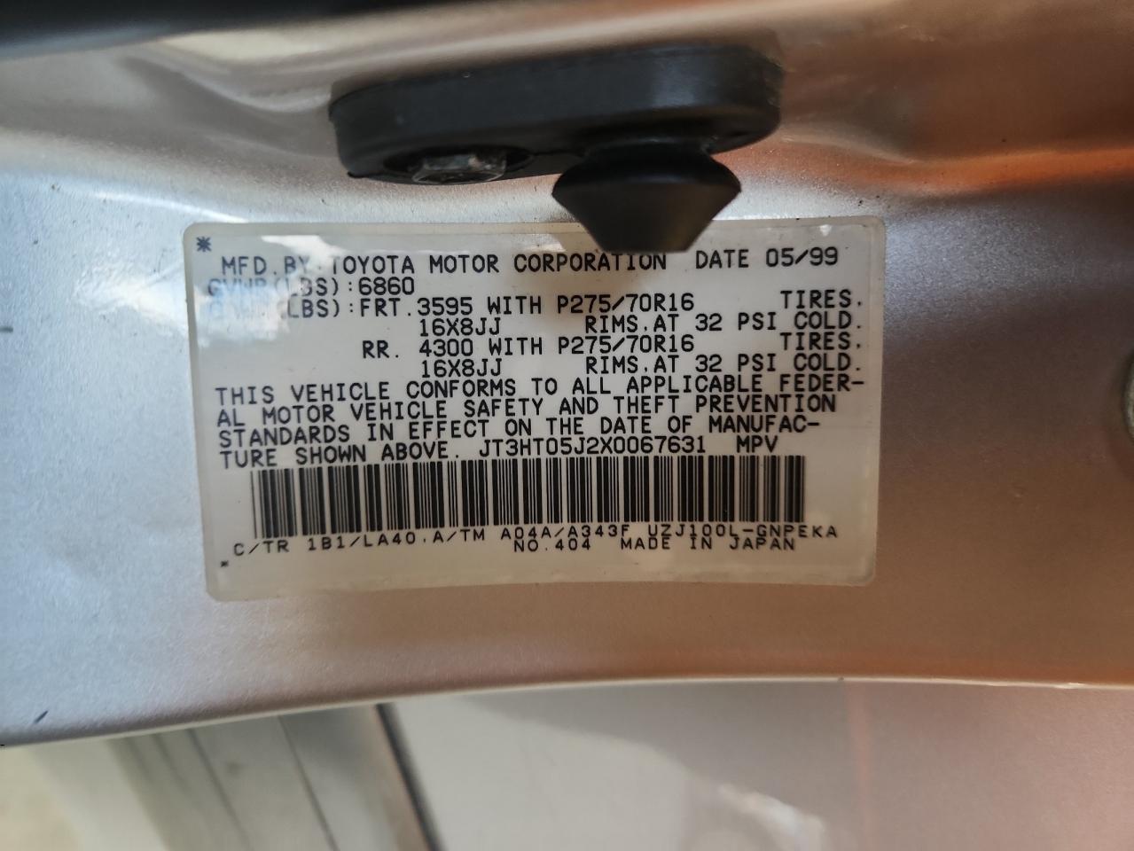 1999 Toyota Land Cruiser    Silver vin: JT3HT05J2X0067631