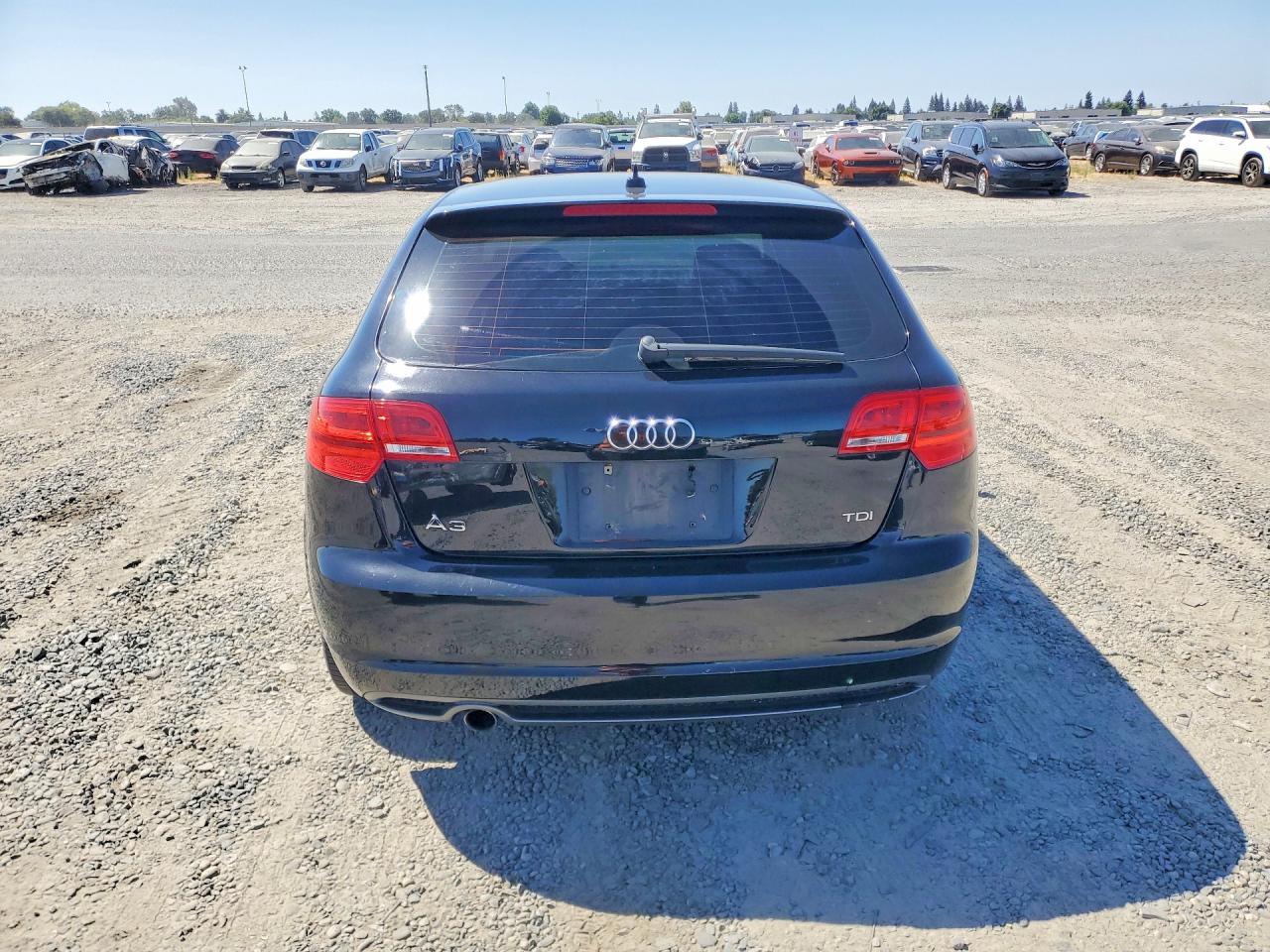 2012 Audi A3 Premium Black vin: WAUBJAFM7CA005357