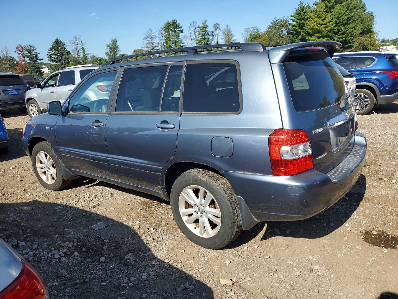 2006 Toyota Highlander Hybrid Blue vin: JTEEW21A460011336