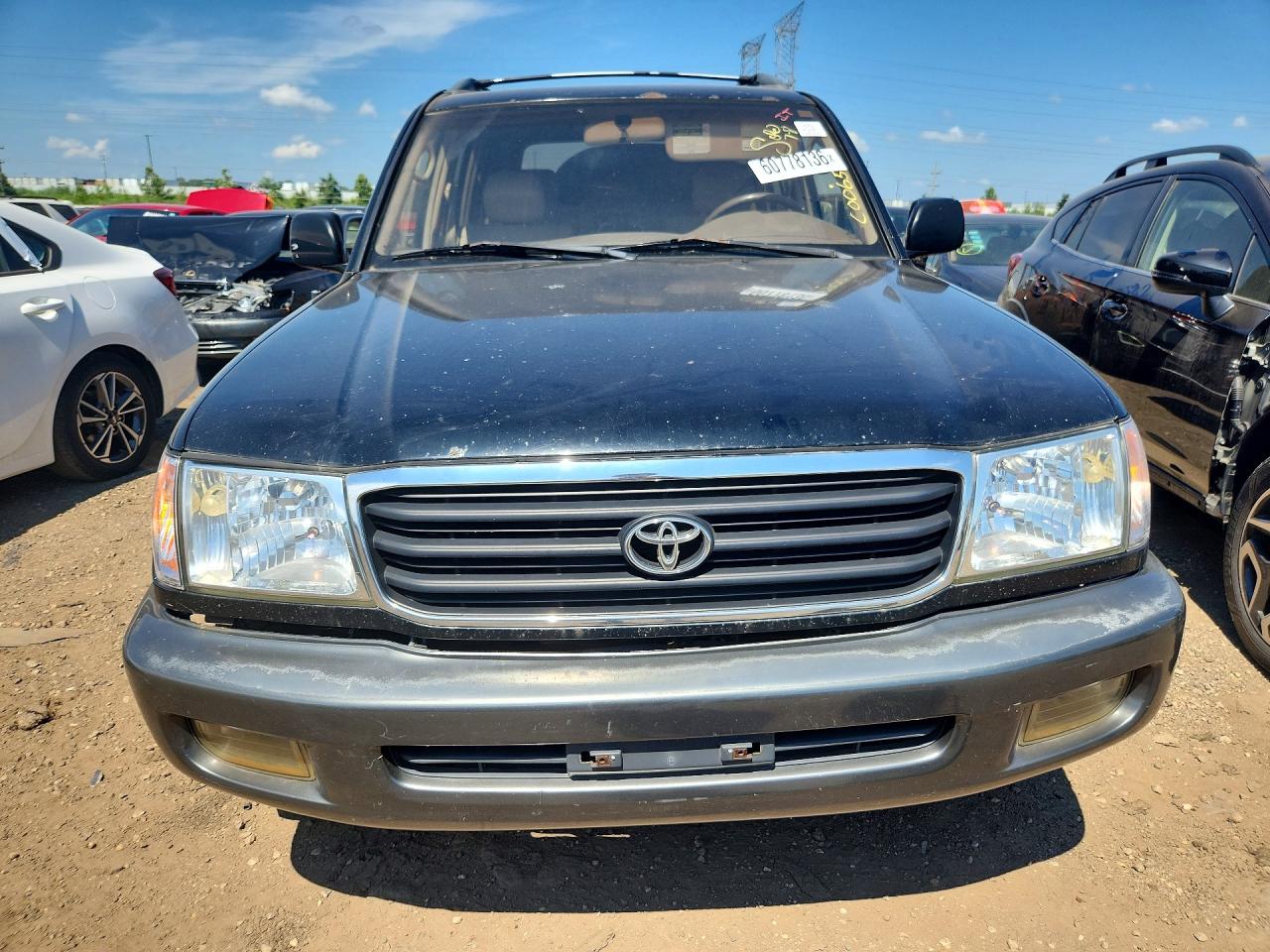 1998 Toyota Land Cruiser Base Black vin: JT3HT05J9W0015962