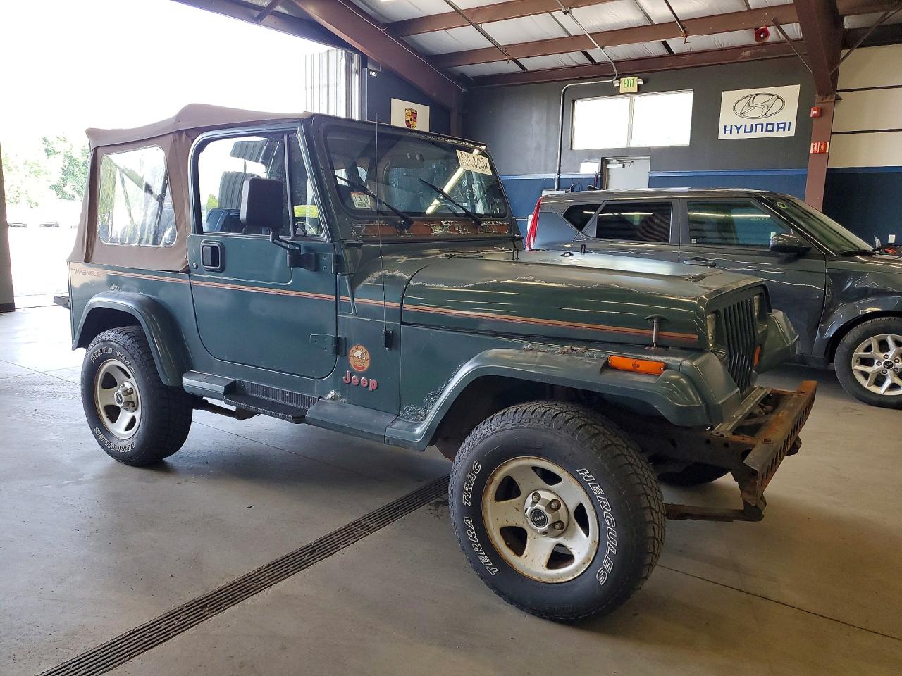 1994 Jeep Wrangler / Yj Sahara Green vin: 1J4FY49S8RP424247