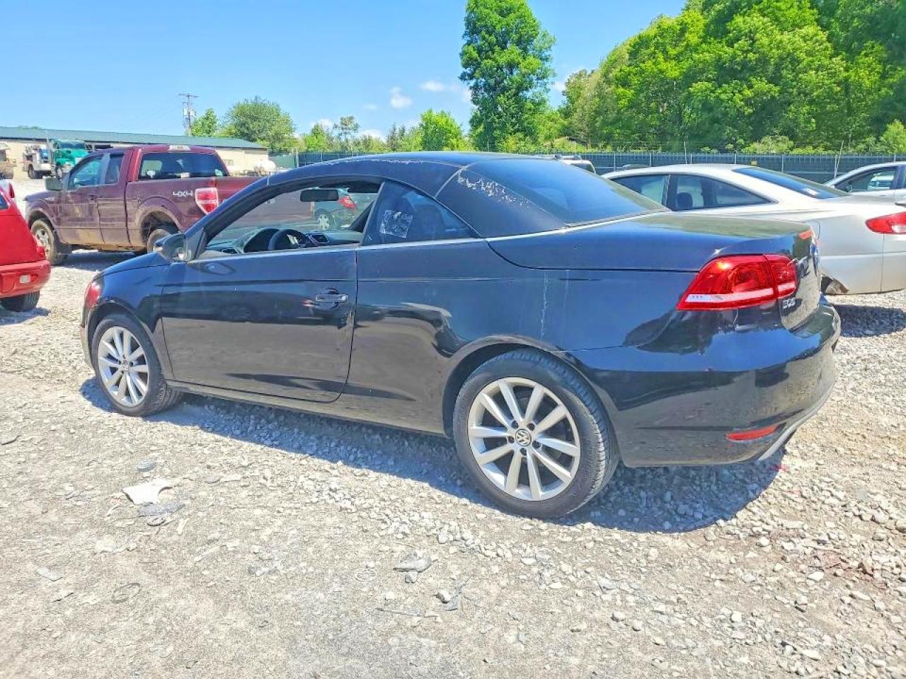 2012 Volkswagen Eos Komfort Black vin: WVWBW7AH8CV005362