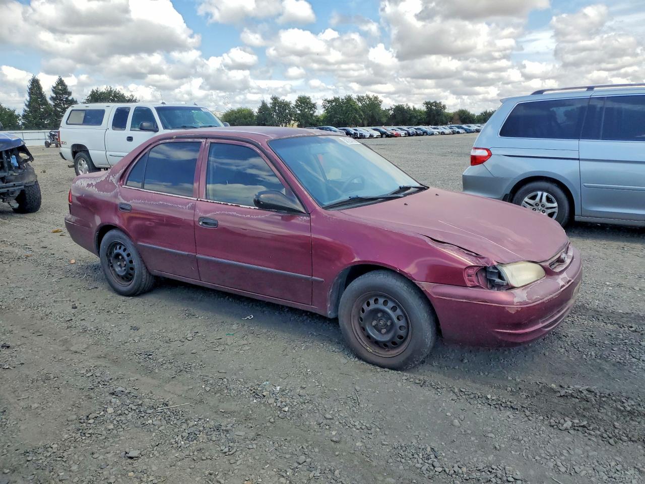 1998 Toyt Corolla Burgundy vin: 1NXBR12E5WZ021632