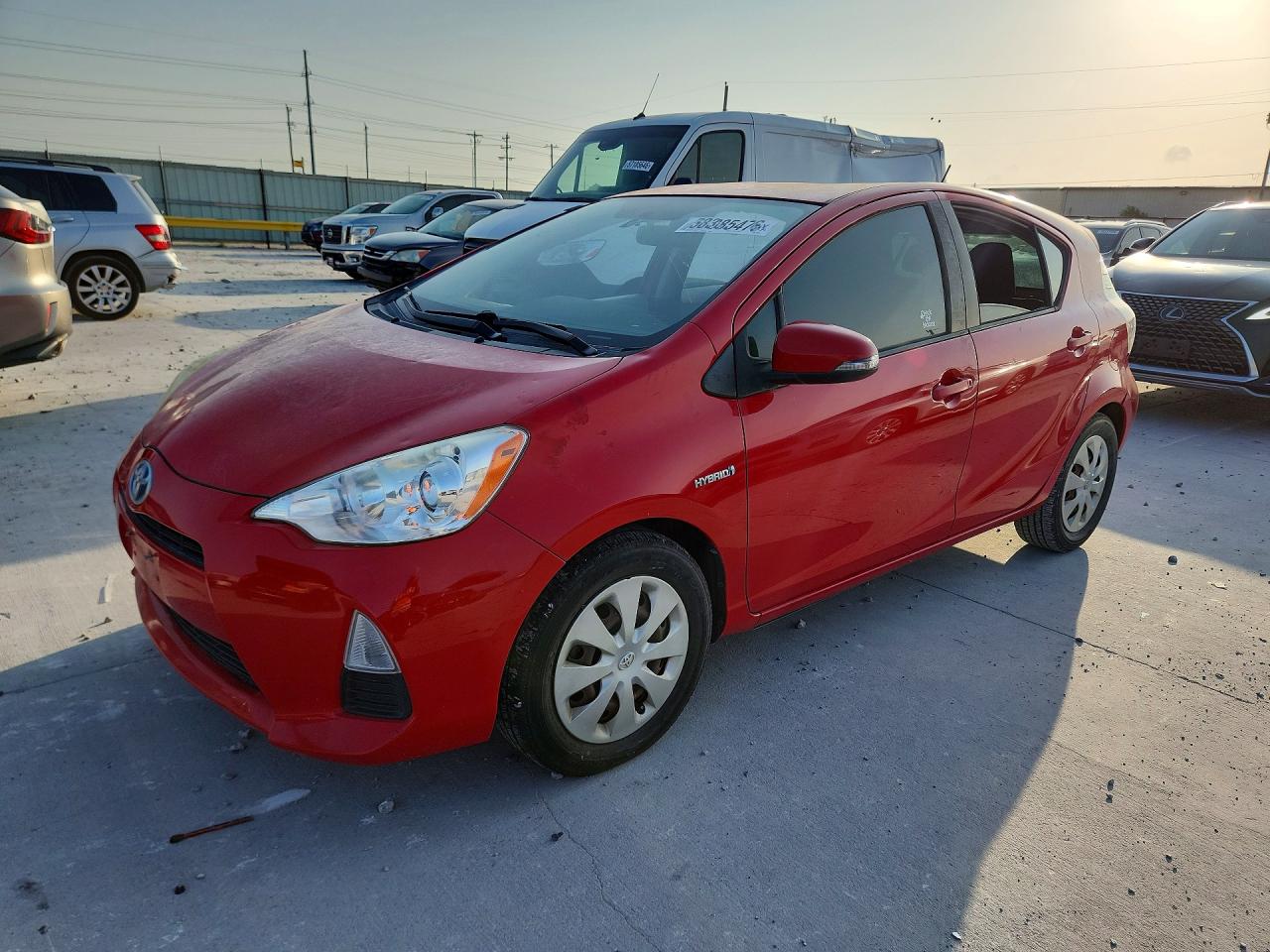 2012 Toyota Prius C Two Red vin: JTDKDTB31C1503220
