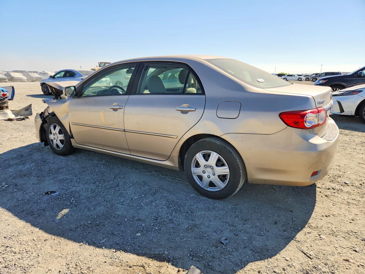 2011 Toyota Corolla Le Tan vin: JTDBU4EE4B9167372