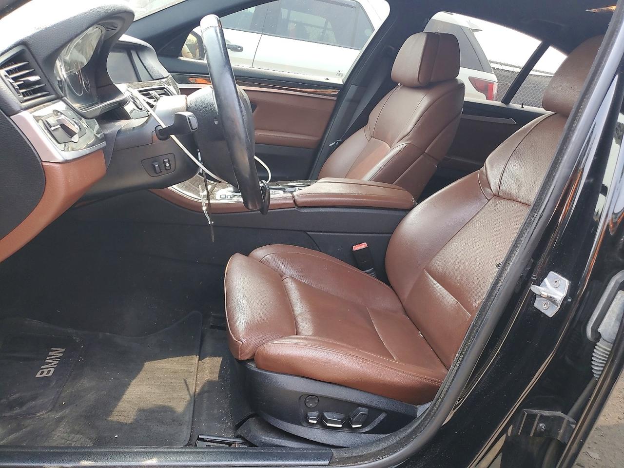 2013 Bmw 535 Xi Черный vin: WBAFU7C5XDDU75830