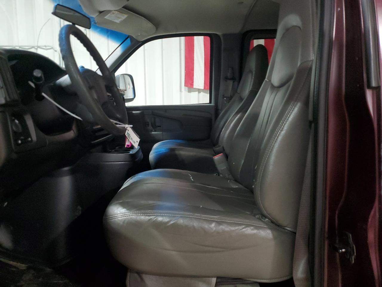2003 Chevrolet Express G3500 Red vin: 1GAHG39U031231526 Damage: Left Front Seat, Worn, Replacement Required