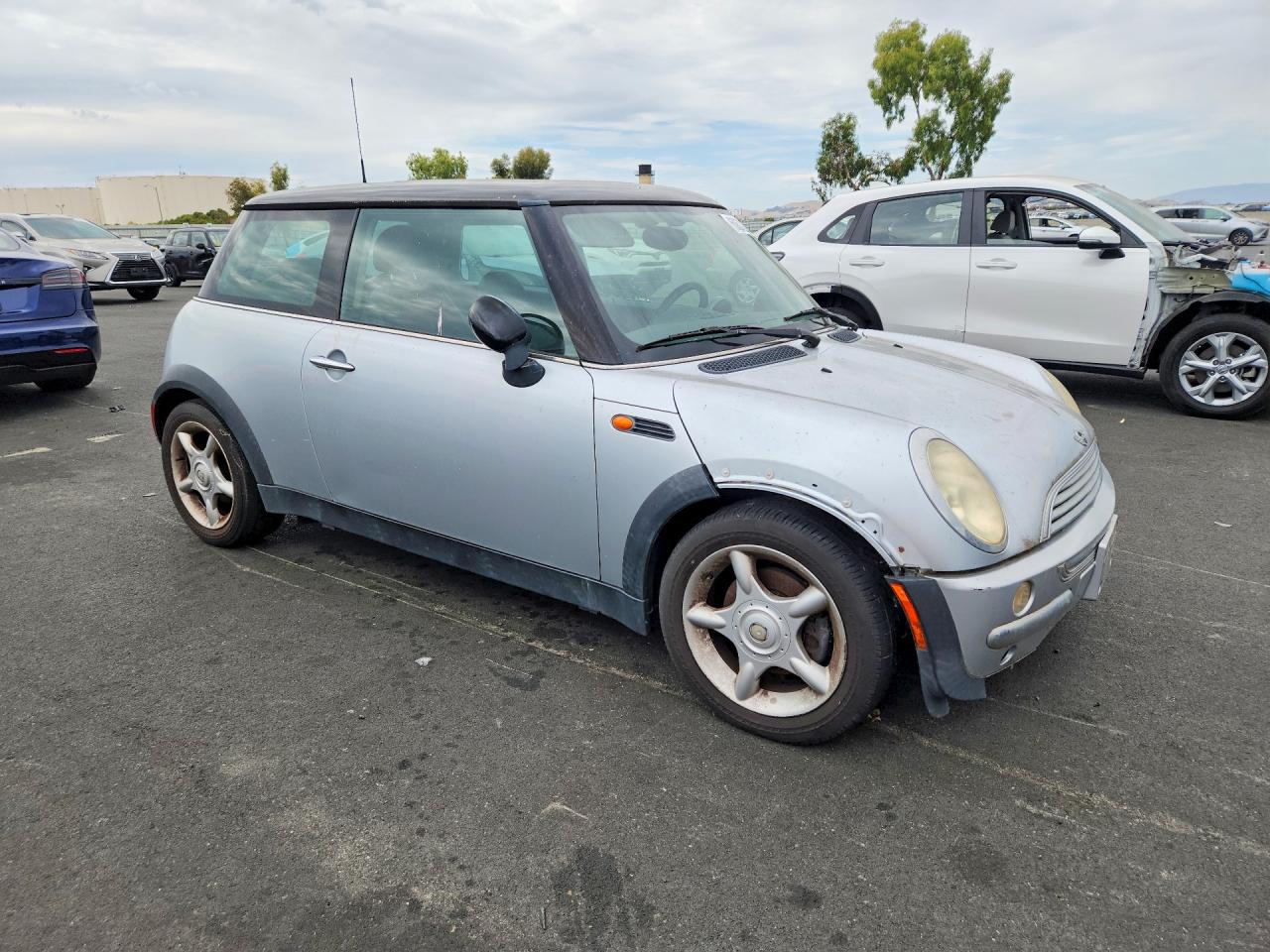 2004 Mini Cooper Silver vin: WMWRC33434TJ62740