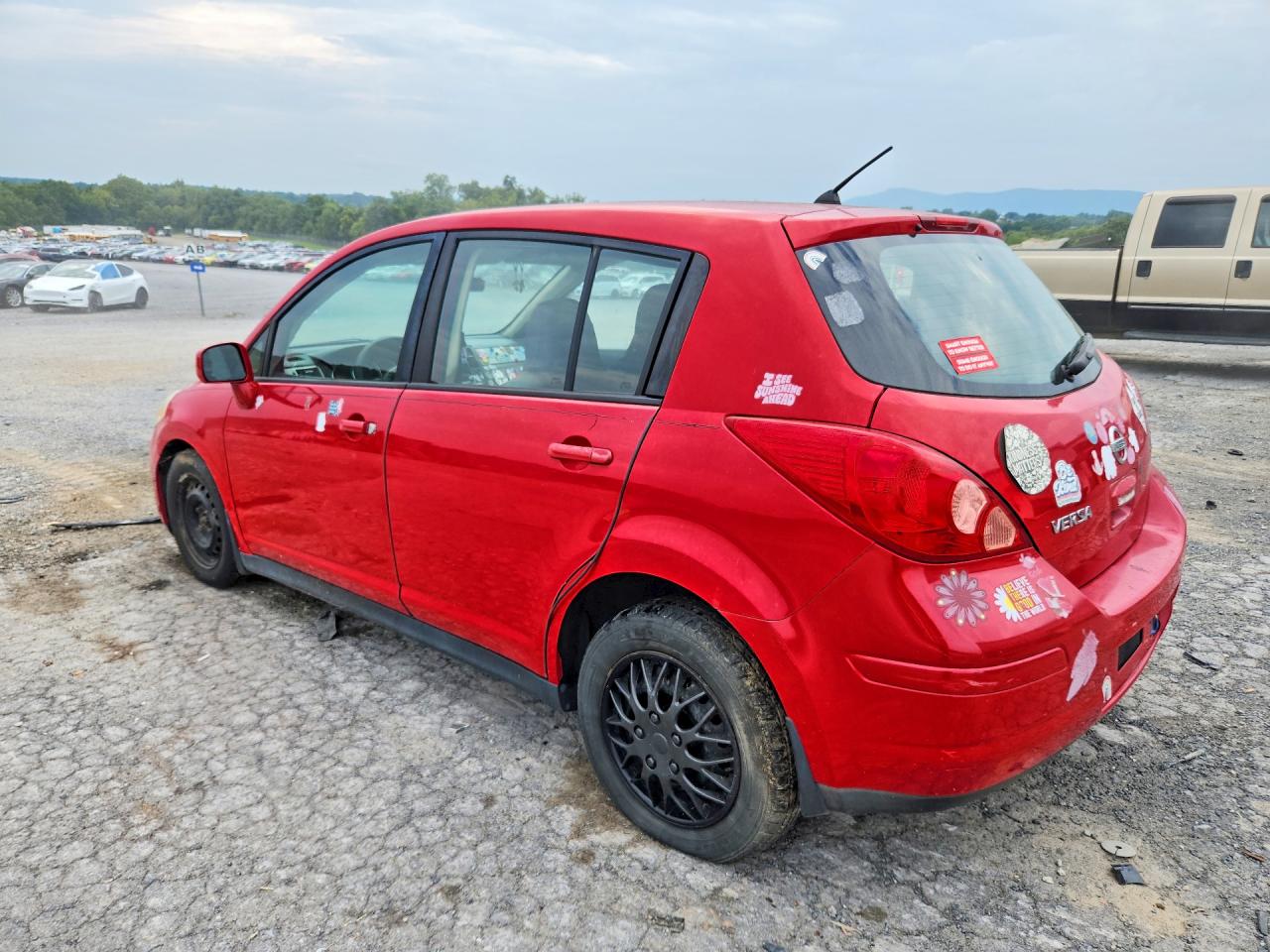 2009 Nissan Versa 1.8 S Red vin: 3N1BC13E19L364959