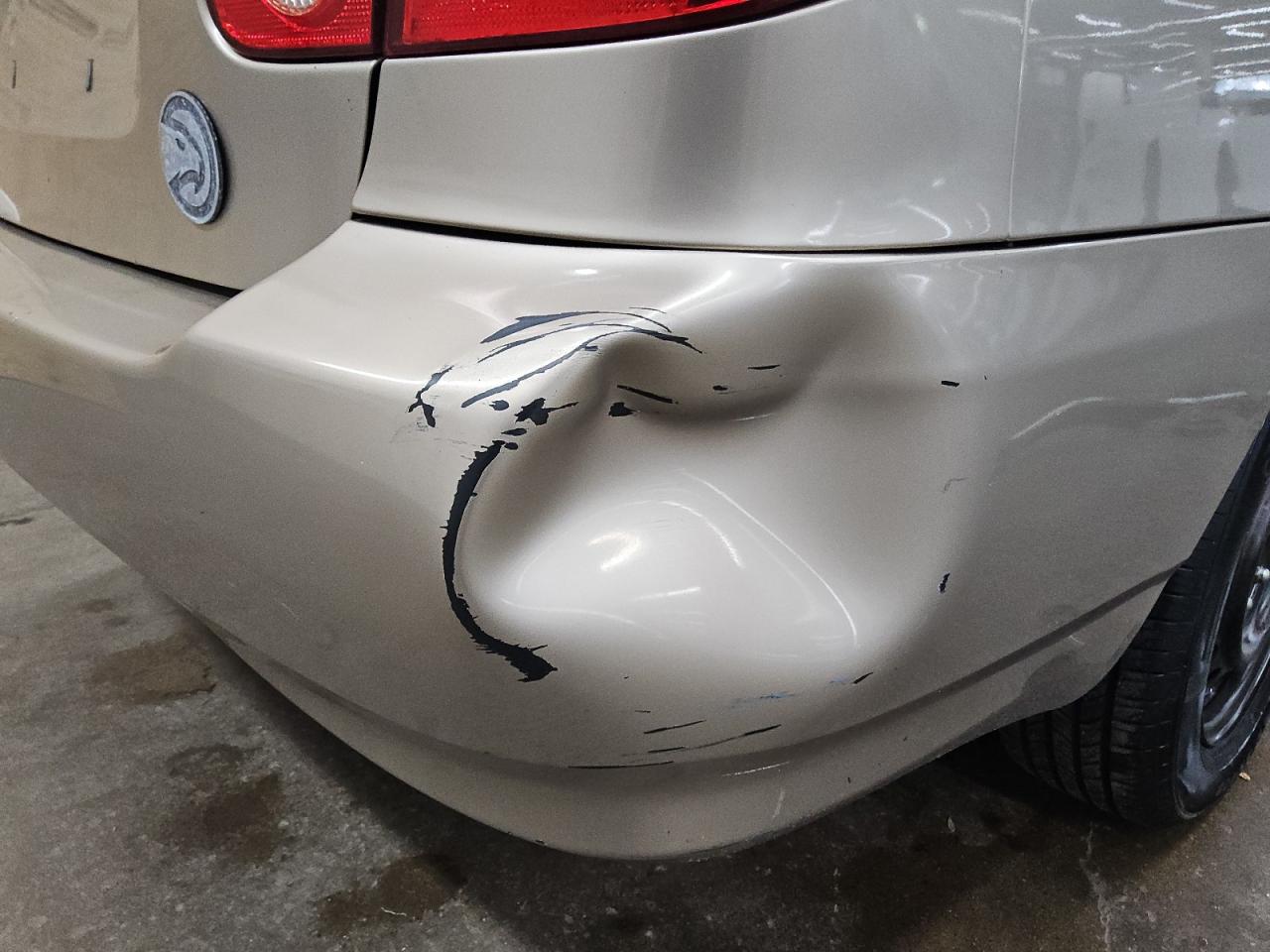 2005 Toyota Corolla Le Beige vin: 1NXBR32E35Z411090 Damage: Rear Bumper, Dent(S) W/ Paint Dmg, > 12 Inches