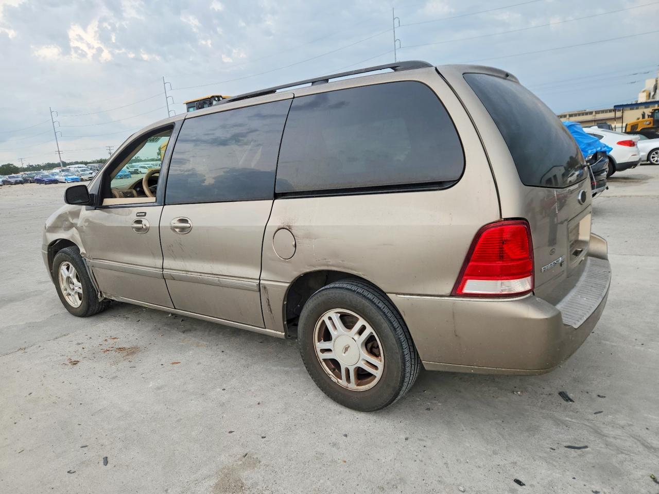 2004 Ford Freestar Sel Золотой vin: 2FMDA52254BA25230