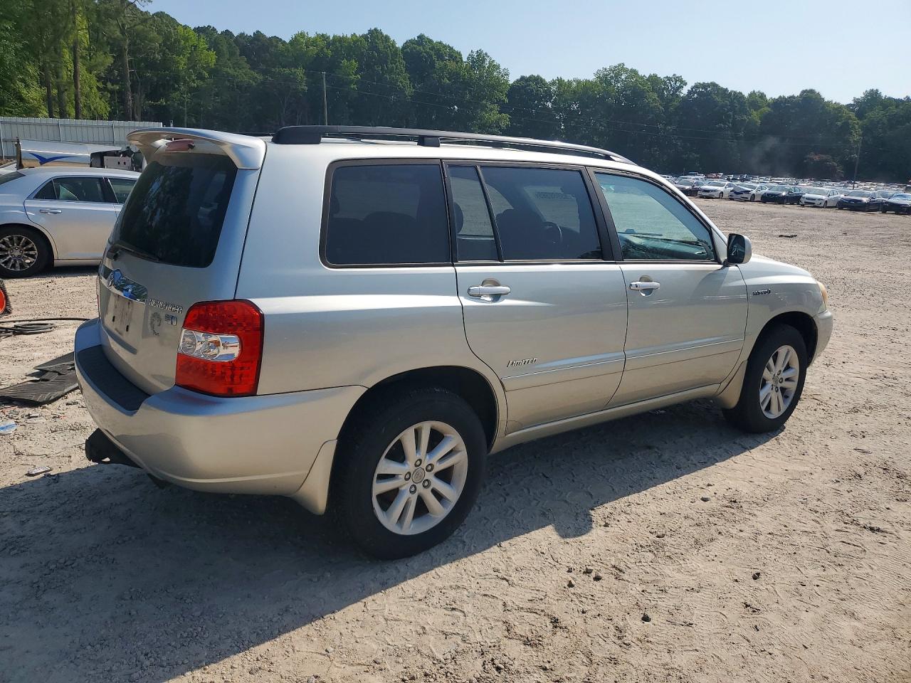 2006 Toyota Highlander Hybrid Gold vin: JTEEW21A860021738