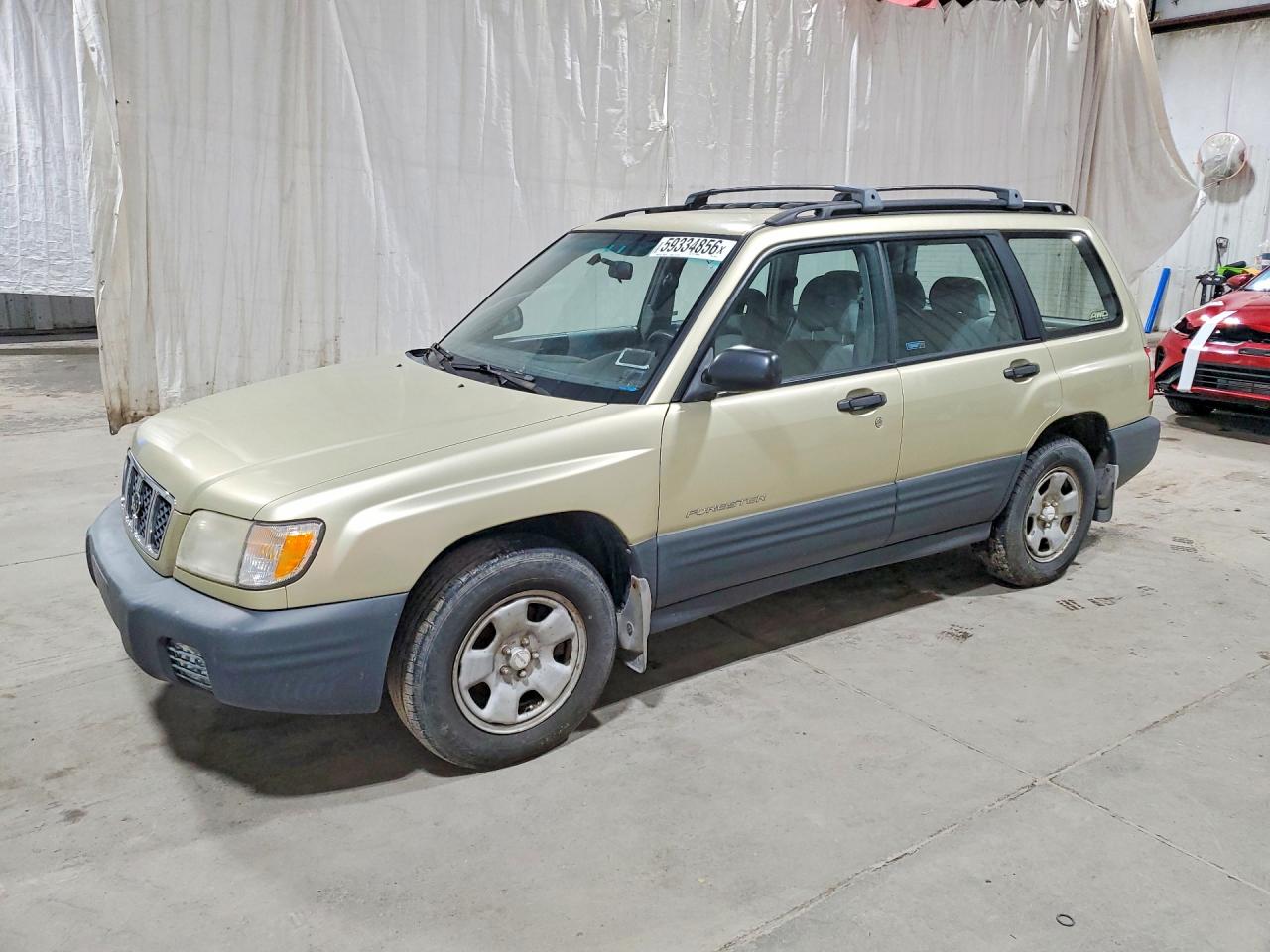 2002 Subaru Forester L Tan vin: JF1SF63502H710852