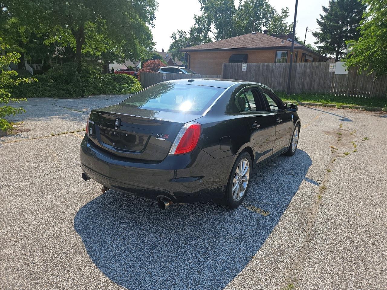 2012 Lincoln Mks Black vin: 1LNHL9FT8CG806403