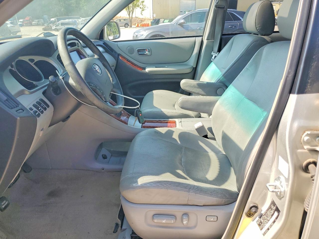 2006 Toyota Highlander Hybrid Gold vin: JTEEW21A860021738