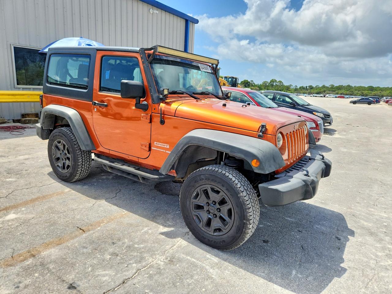 2011 Jeep Wrangler Sport Orange vin: 1J4AA2D16BL574551