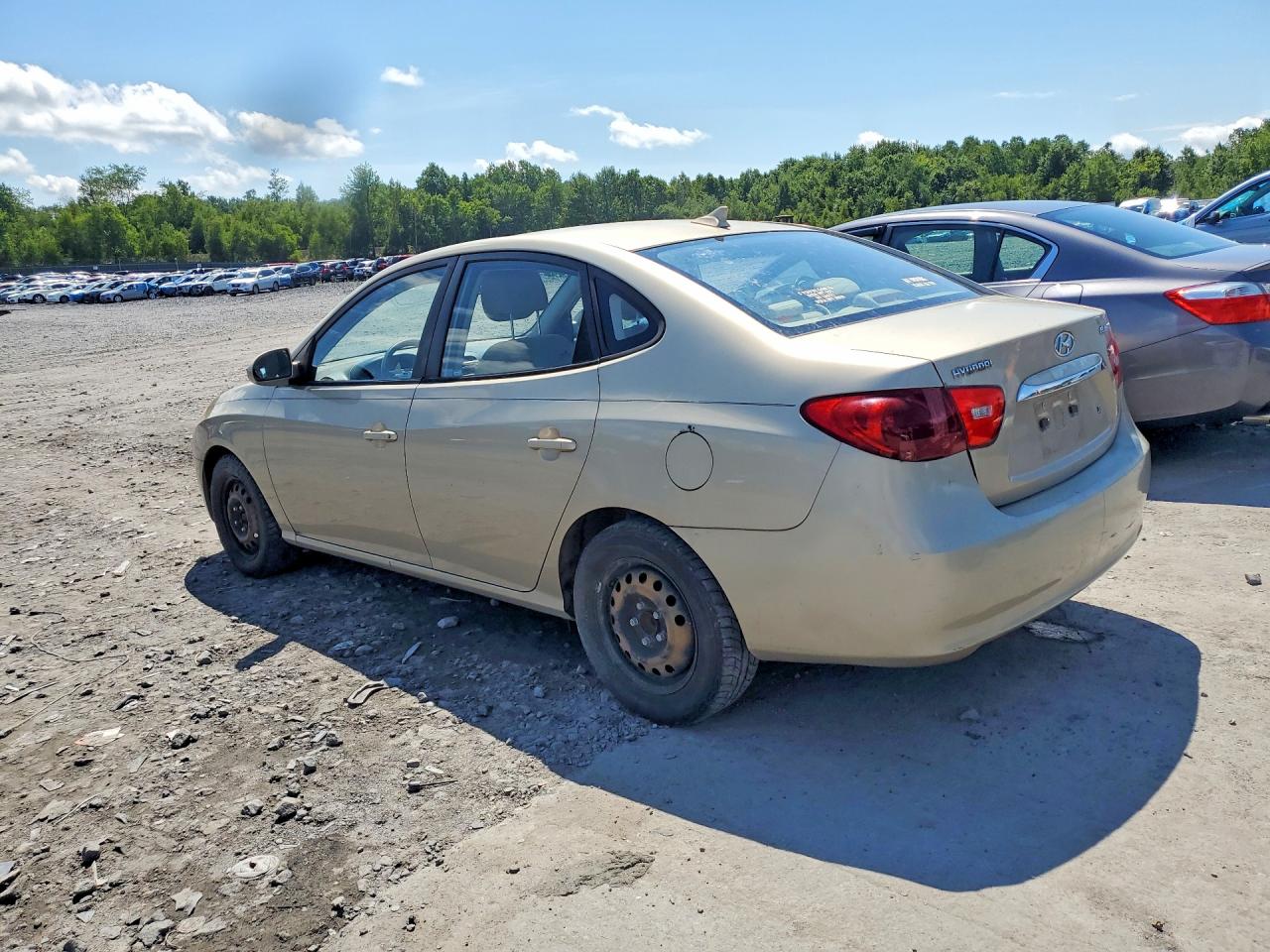 2010 Hyundai Elantra Gls Tan vin: KMHDU4ADXAU023659