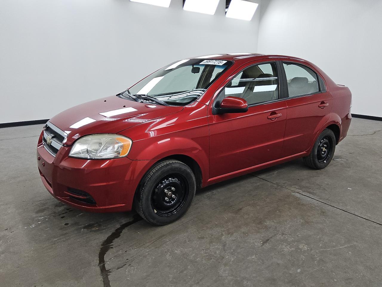 2011 Chevrolet Aveo Red vin: KL1TD5DE9BB220532 Damage: Left Front Tire, Worn, Replacement Required