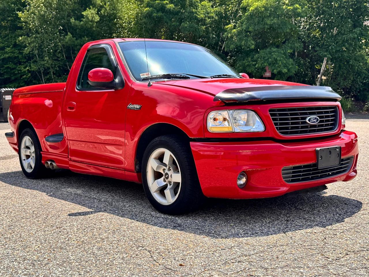 2002 Ford F150 Svt Lightning Red vin: 2FTZF07302CA64542