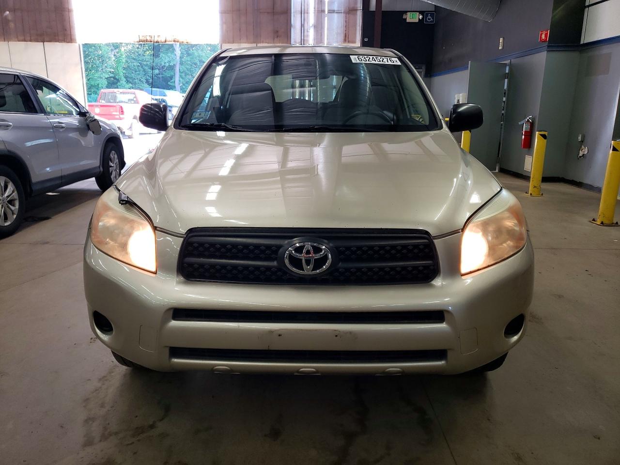 2007 Toyota Rav4 Base Gold vin: JTMBD33V176041072