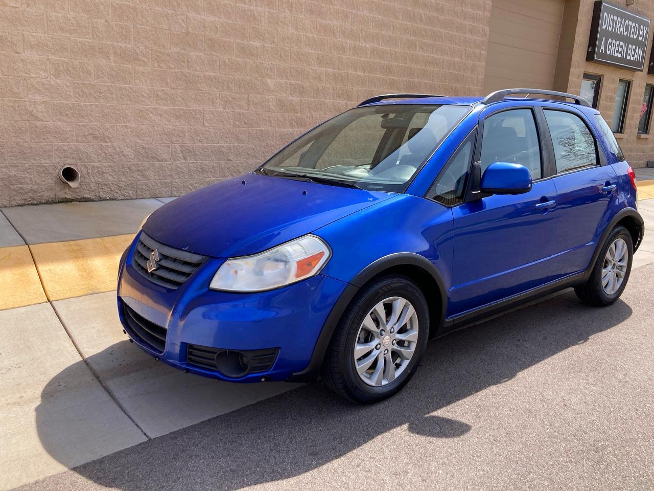 2013 Suzuki Sx4 Blue vin: JS2YB5A31D6101902