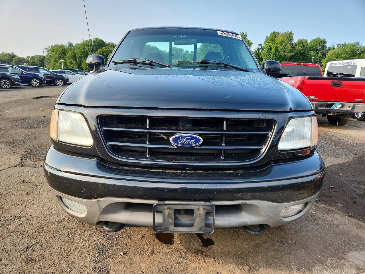 2002 Ford F150 Black vin: 1FTRF182X2NA47575