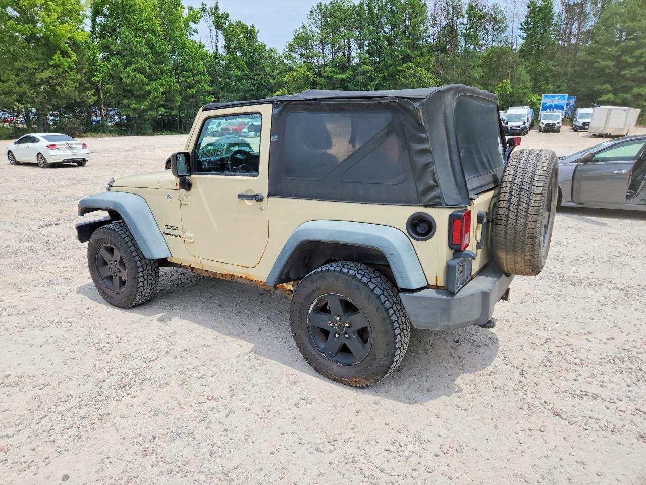 2011 Jeep Wrangler Sport Tan vin: 1J4AA2D11BL620366