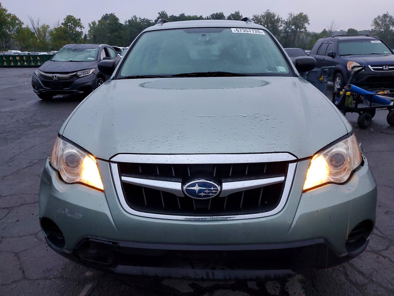 2009 Subaru Outback Teal vin: 4S4BP60C897318093