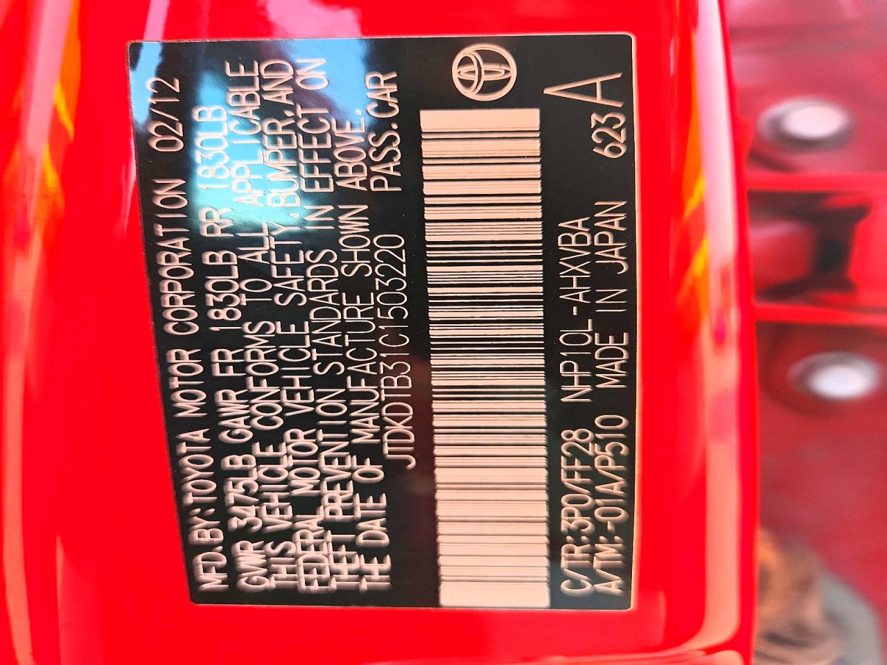 2012 Toyota Prius C Two Red vin: JTDKDTB31C1503220