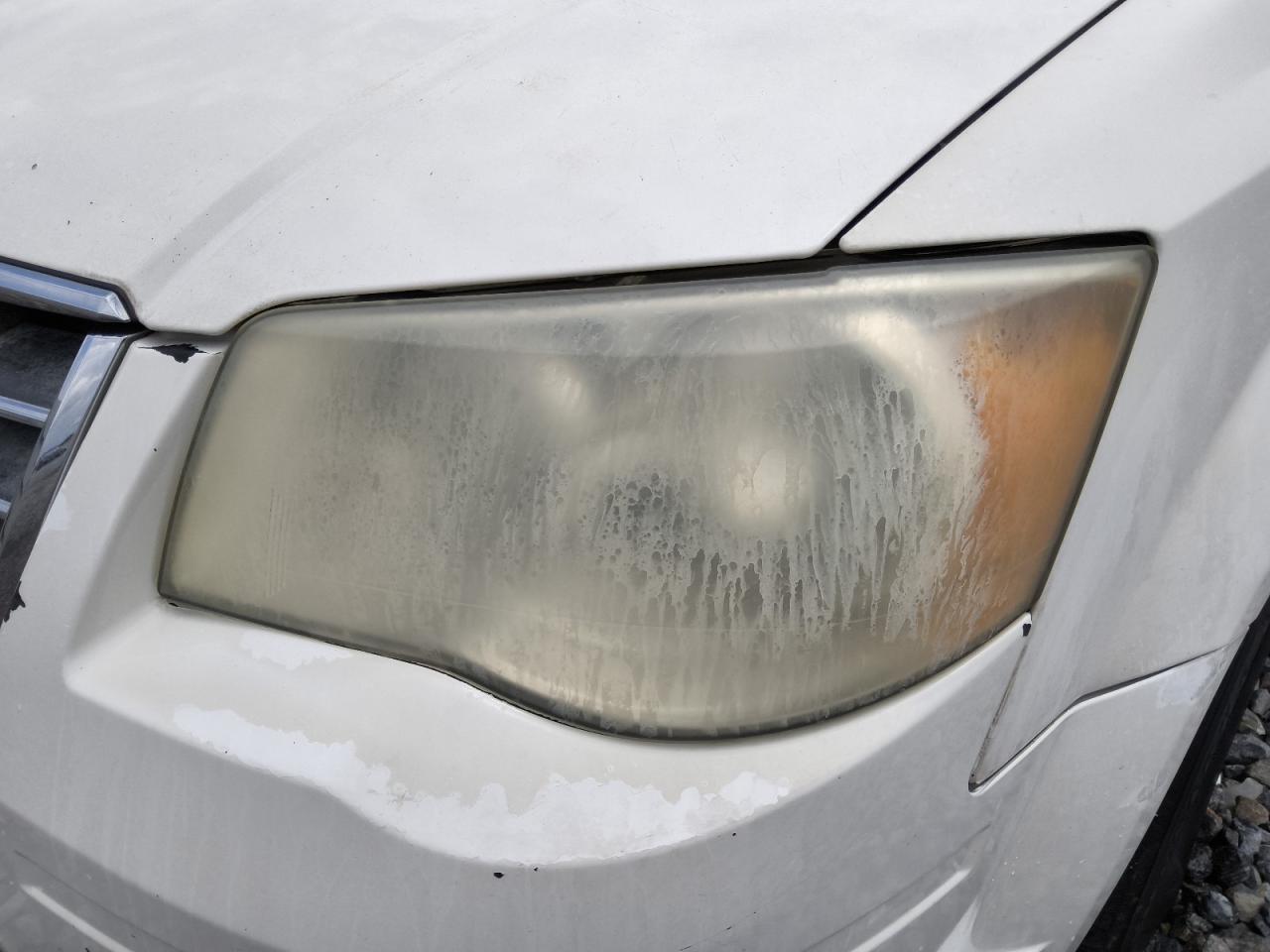 2010 Chrysler Town & Country Touring White vin: 2A4RR5D12AR176319 Damage: Left Head Lamp, Faded, Repair Required