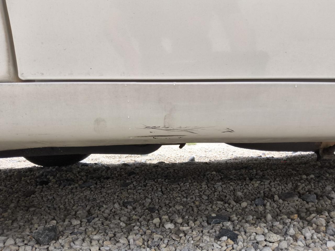2010 Chrysler Town & Country Touring White vin: 2A4RR5D12AR176319 Damage: Right Rocker Panel, Heavy Scratch, 5 To 6 Inches