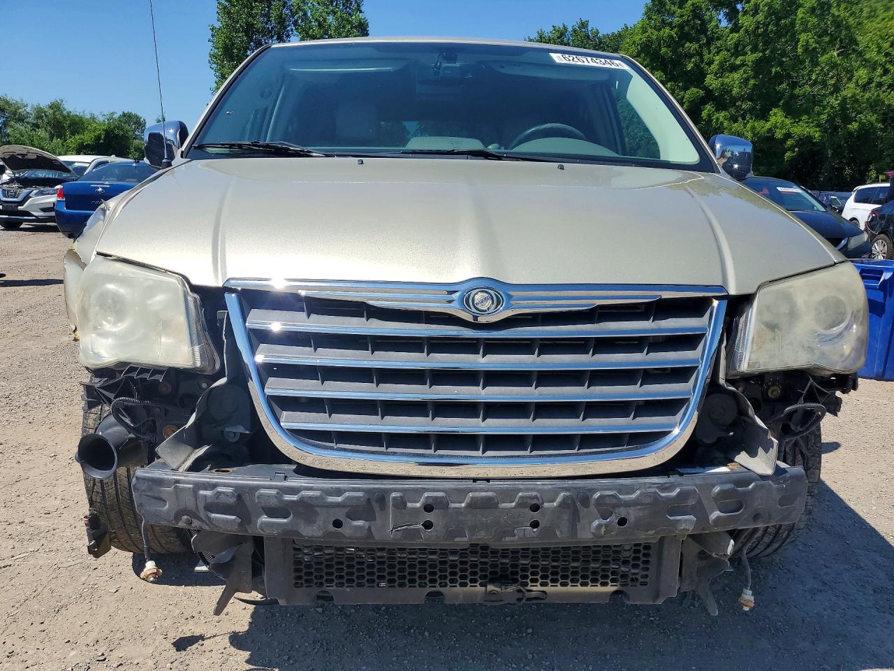 2010 Chrysler Town & Country Limited Желто-коричневый vin: 2A4RR6DX0AR207318