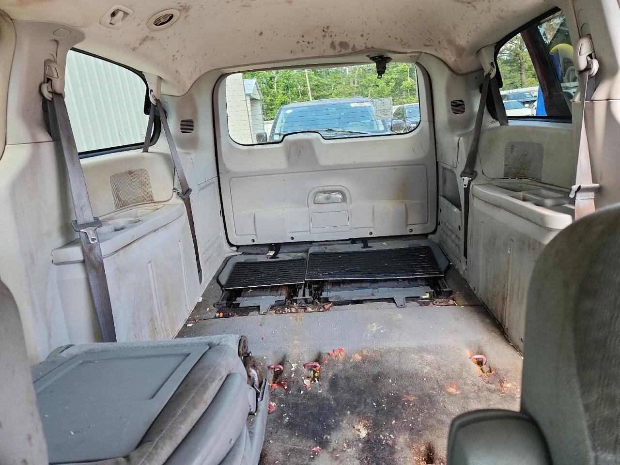 2009 Chrysler Town & Country Lx Red vin: 2A8HR44E39R656985 Damage: Left Rear Carpet, Stained, Permanent