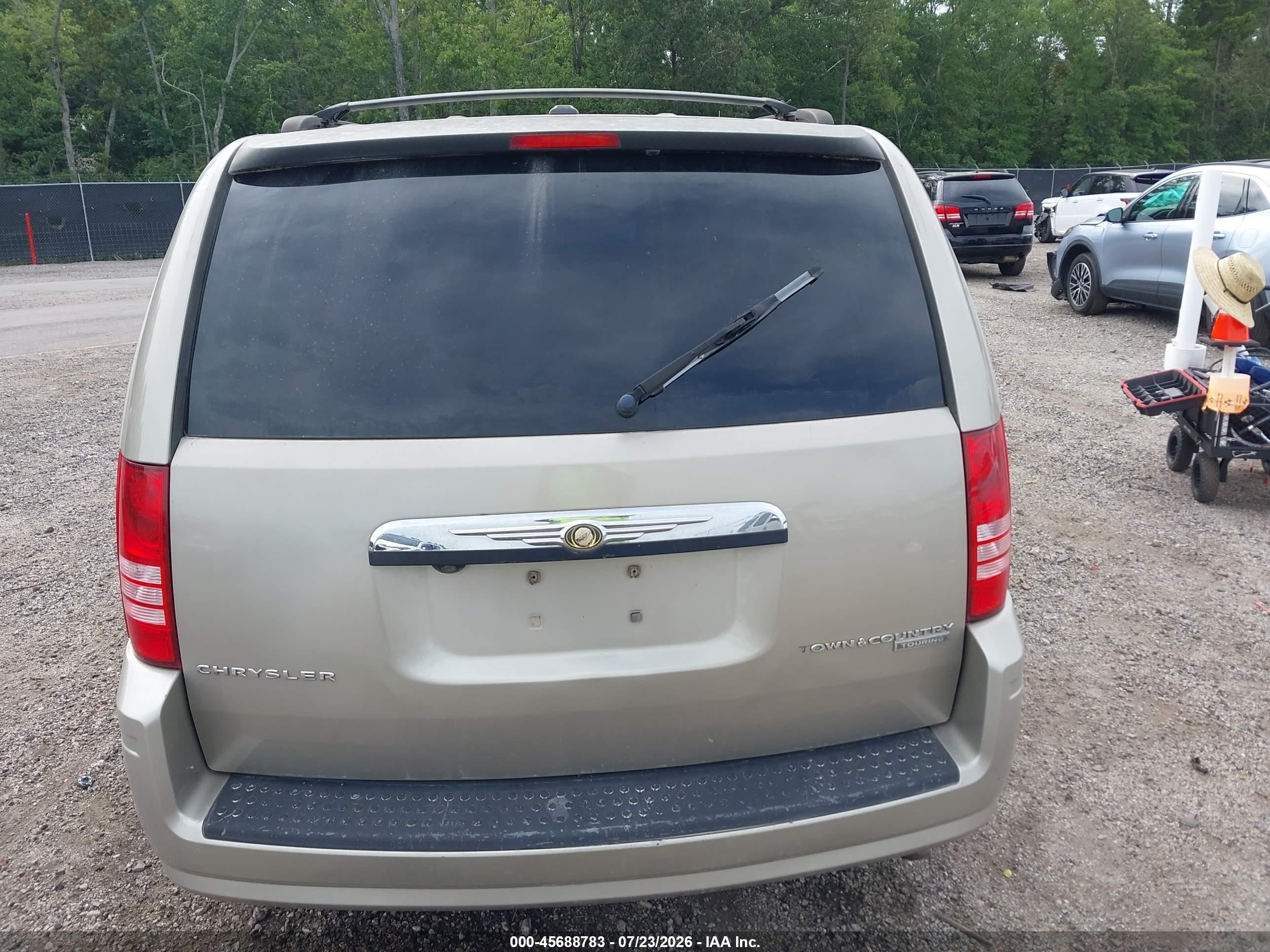 2009 Chrysler Town & Country Touring Золотой vin: 2A8HR54179R640033