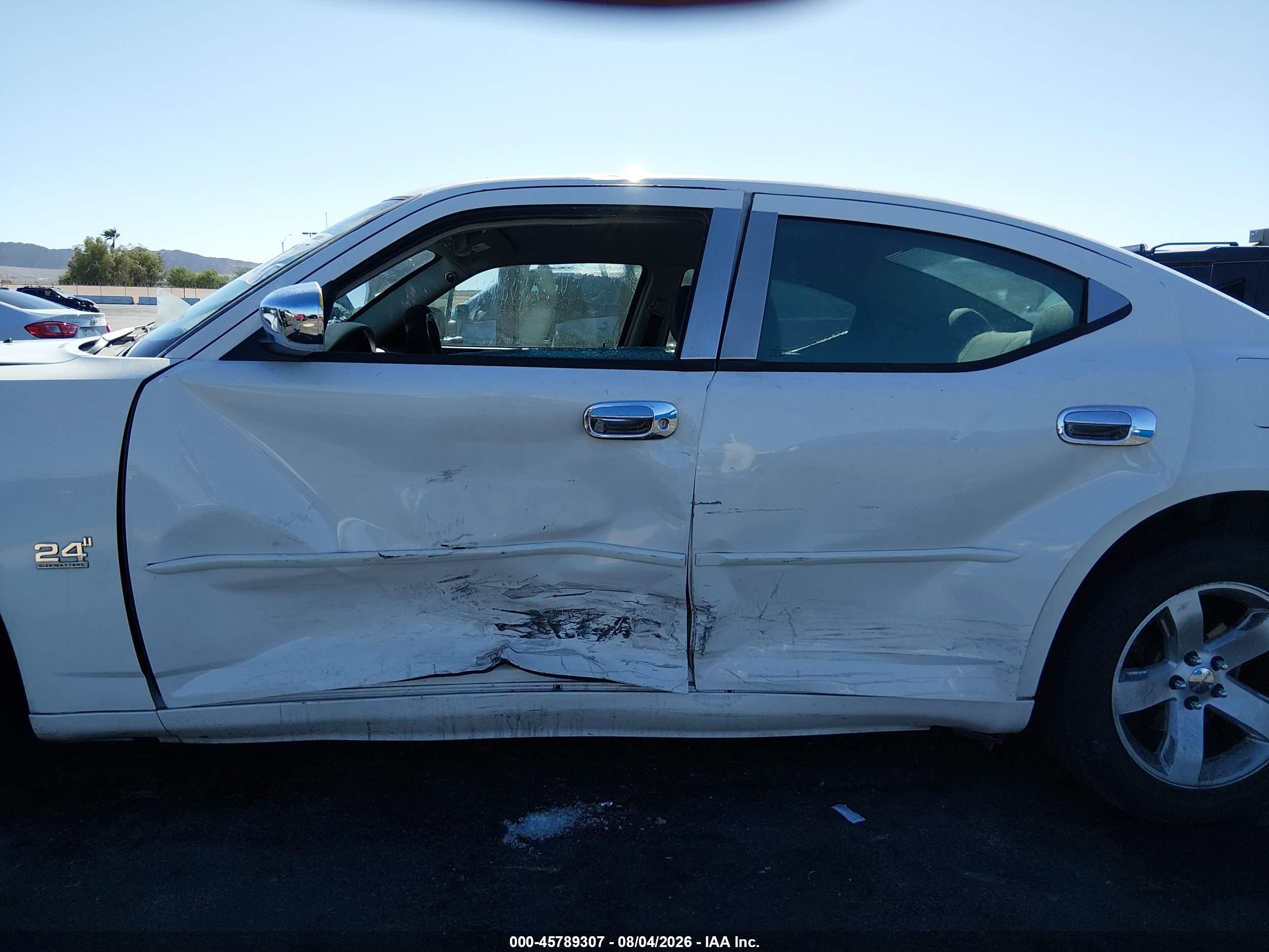 2006 Dodge Charger   White vin: 2B3KA43G66H472652