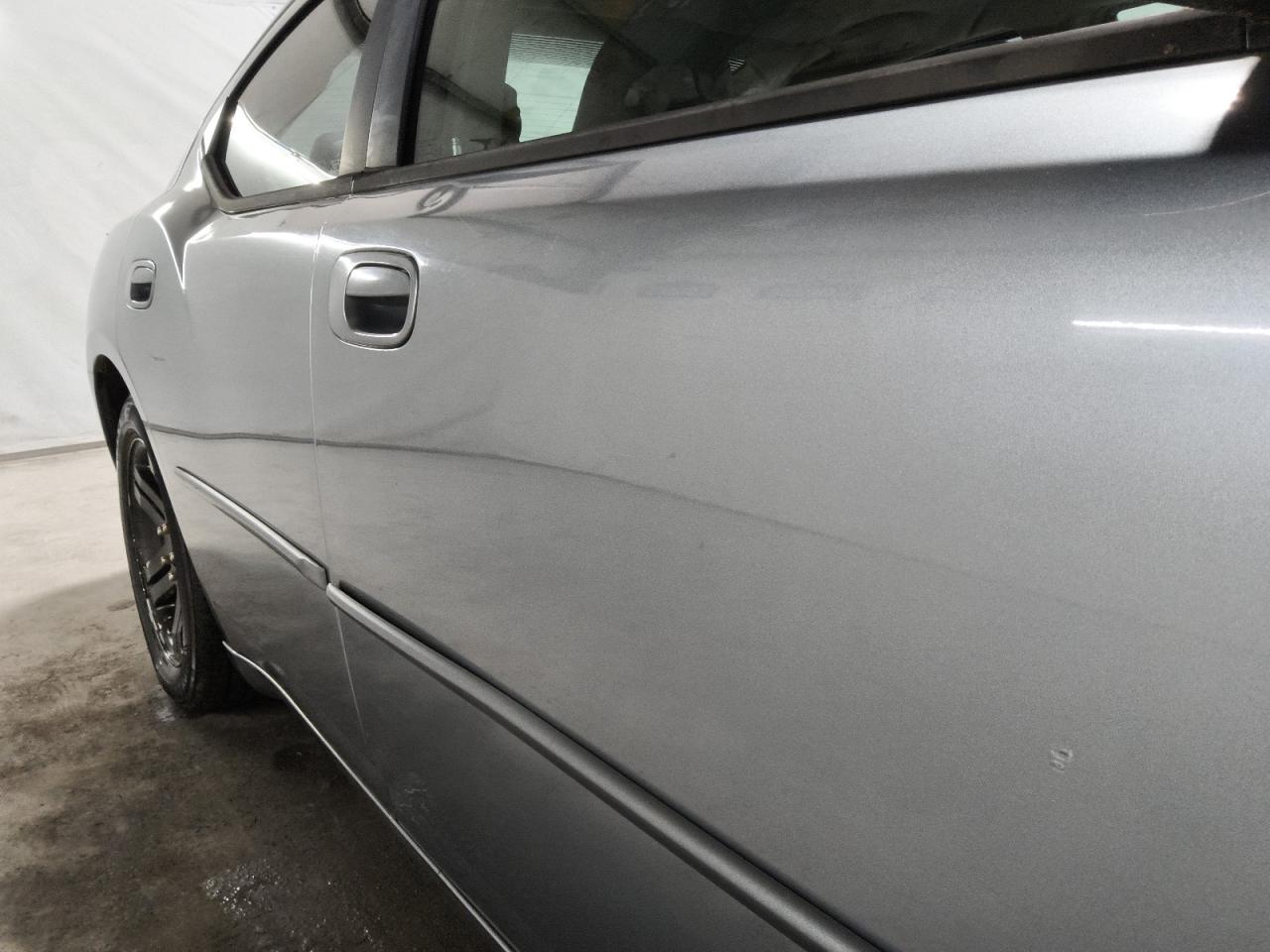 2006 Dodge Charger R/t Silver vin: 2B3LA53H56H344468 Damage: Right Front Door, Heavy Scratch, 1/2 To 1 Inch