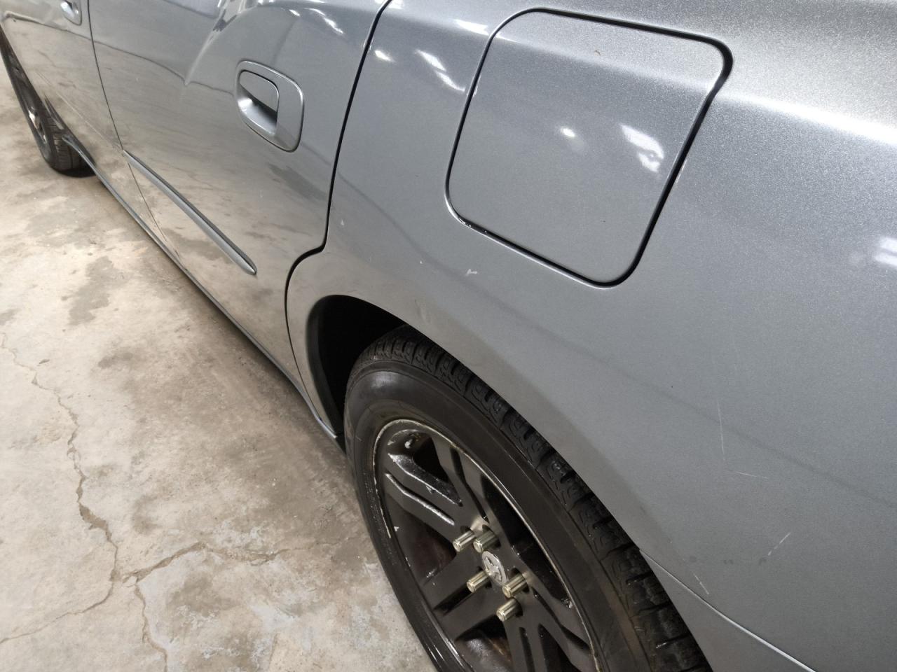 2006 Dodge Charger R/t Silver vin: 2B3LA53H56H344468 Damage: Left Qtr Panel, Dent(S) W/ Paint Dmg, 1/2 To 1 Inch