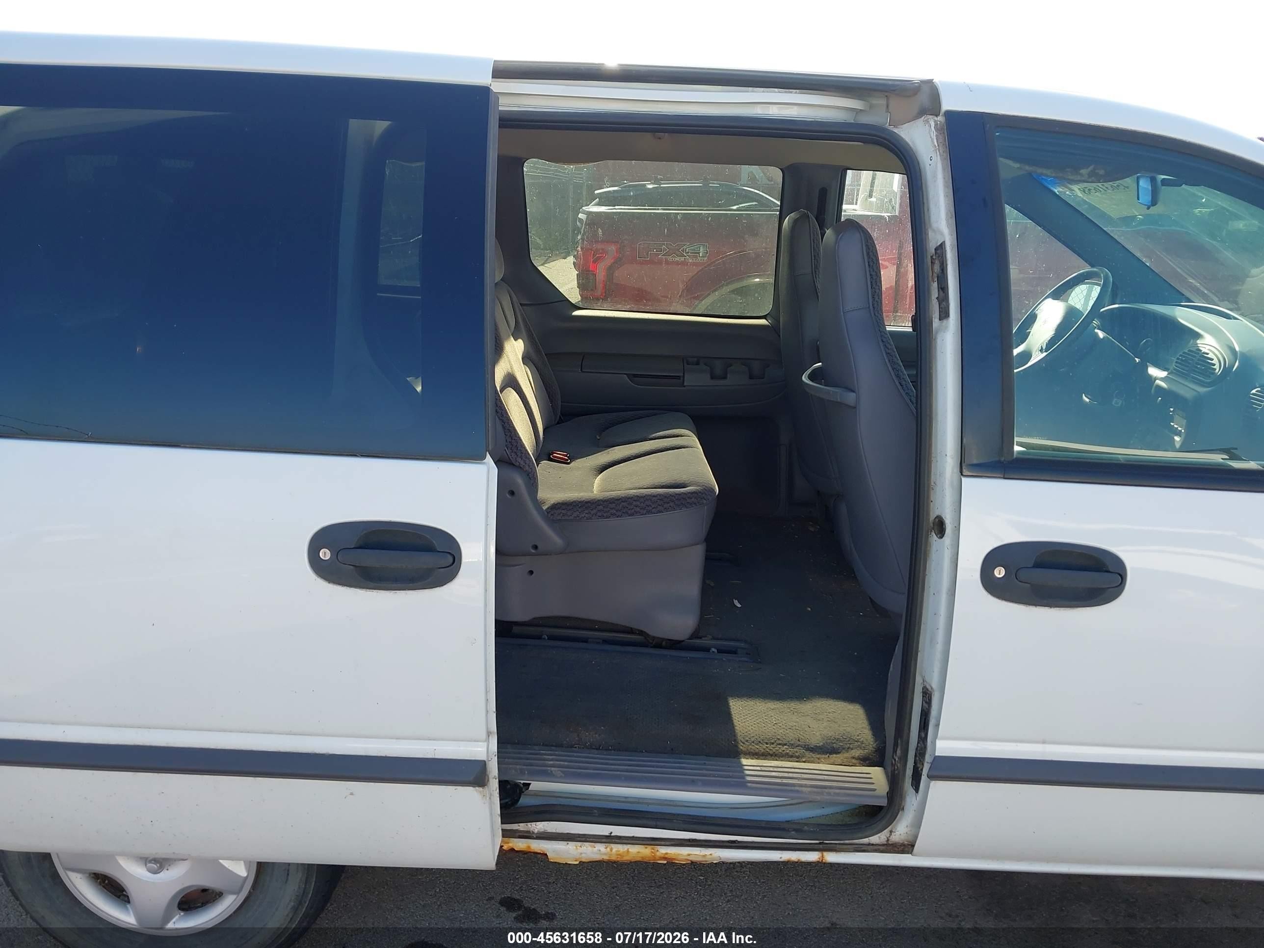 1999 Dodge Caravan   White vin: 2B4FP2534XR347574