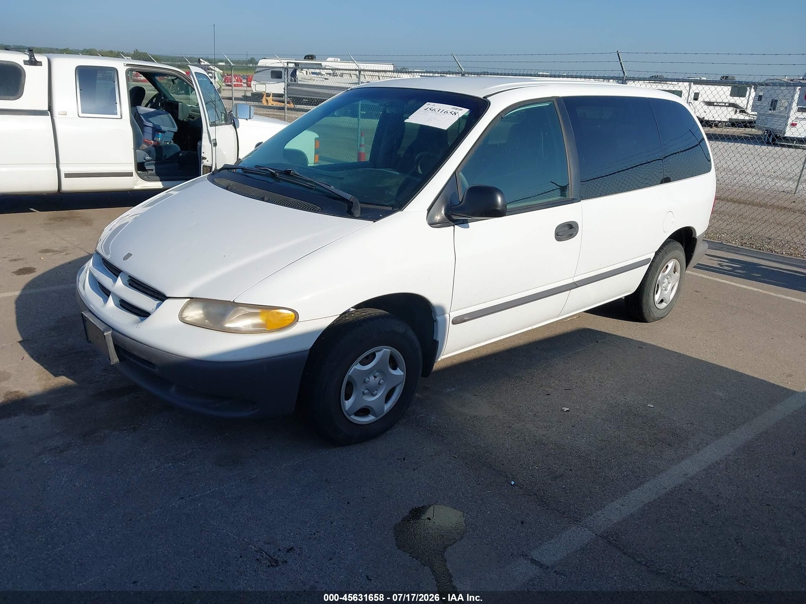 1999 Dodge Caravan   White vin: 2B4FP2534XR347574