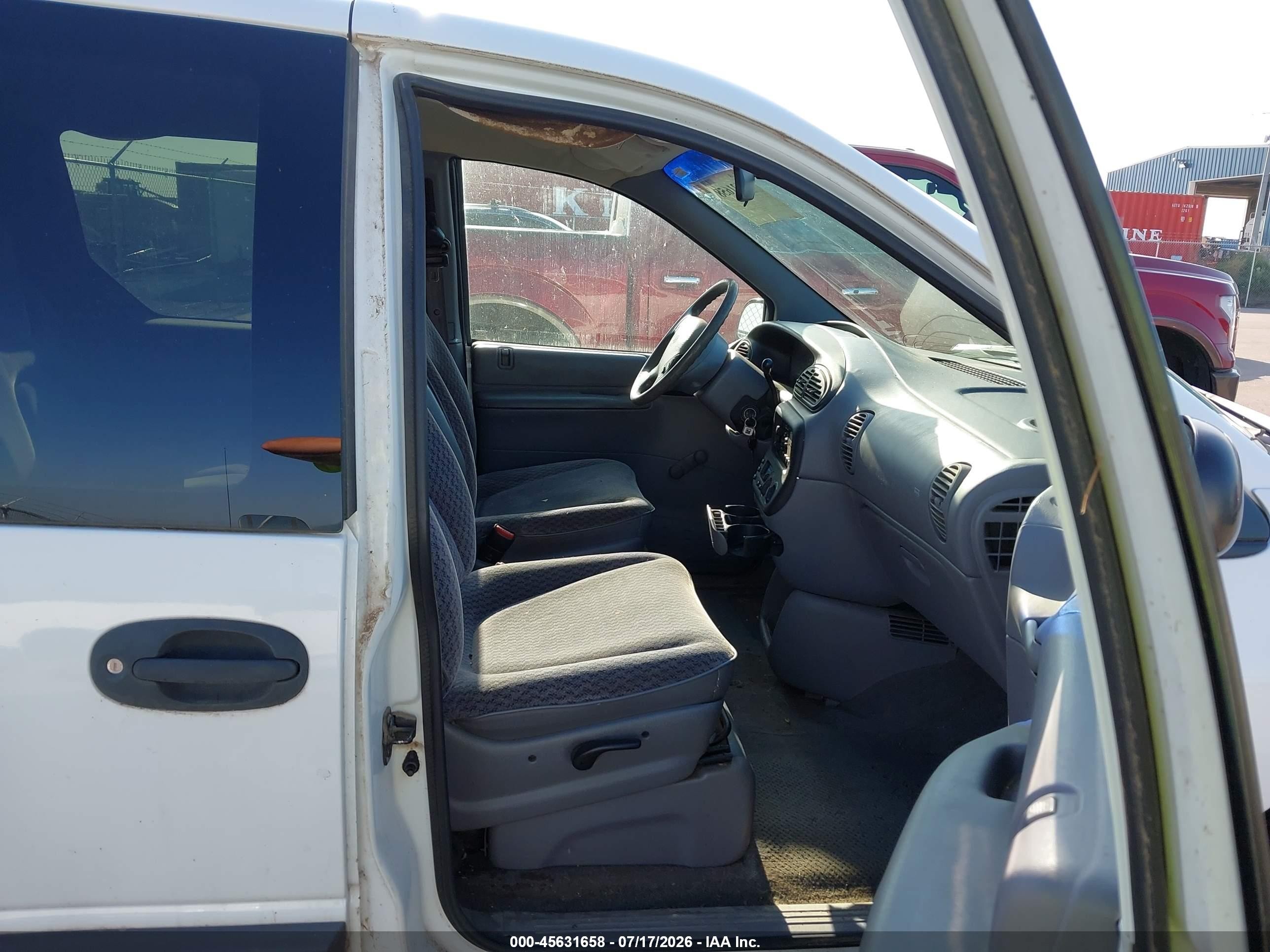 1999 Dodge Caravan   White vin: 2B4FP2534XR347574