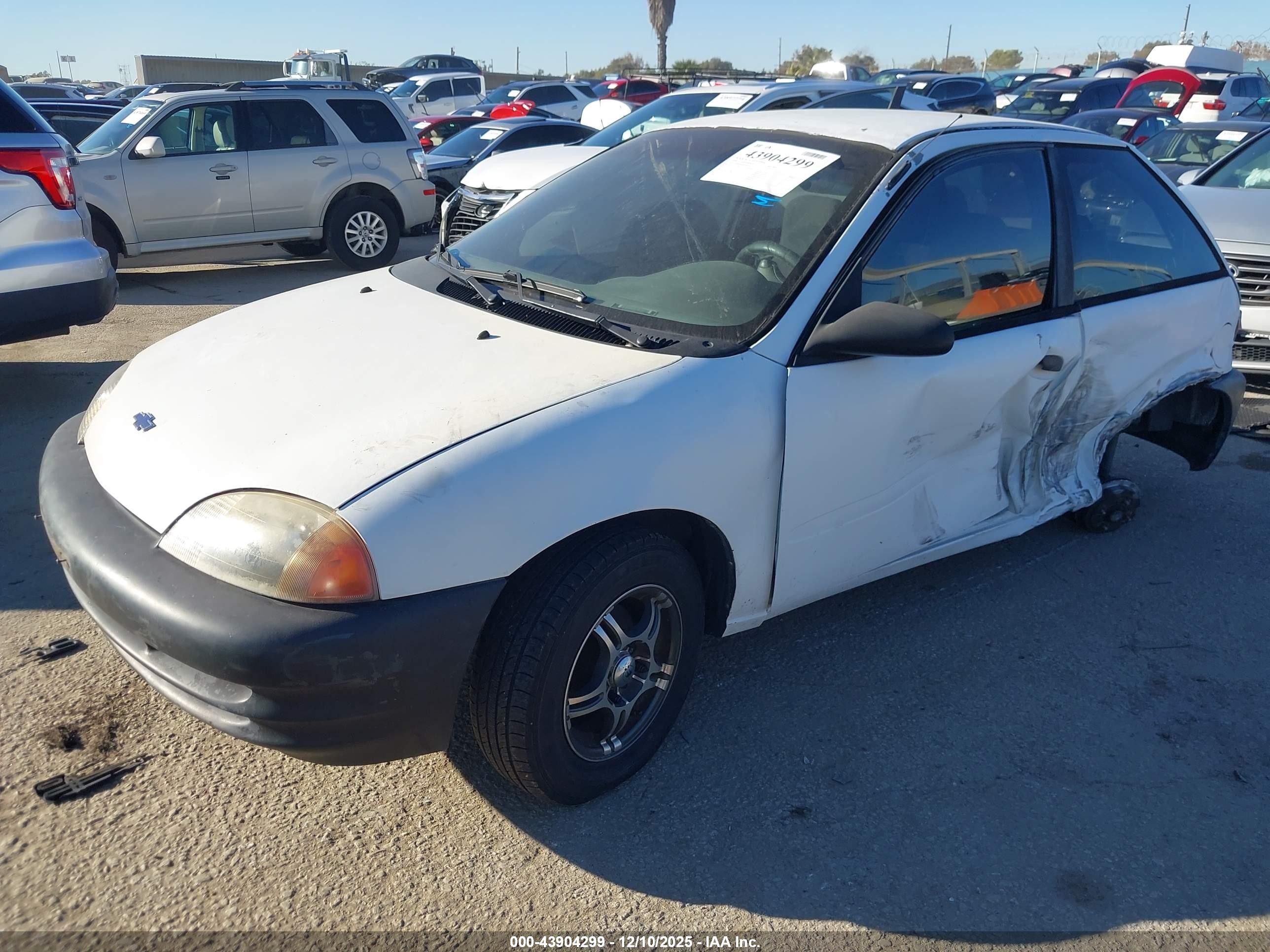 1998 Chevrolet Metro   White vin: 2C1MR2260W6701428