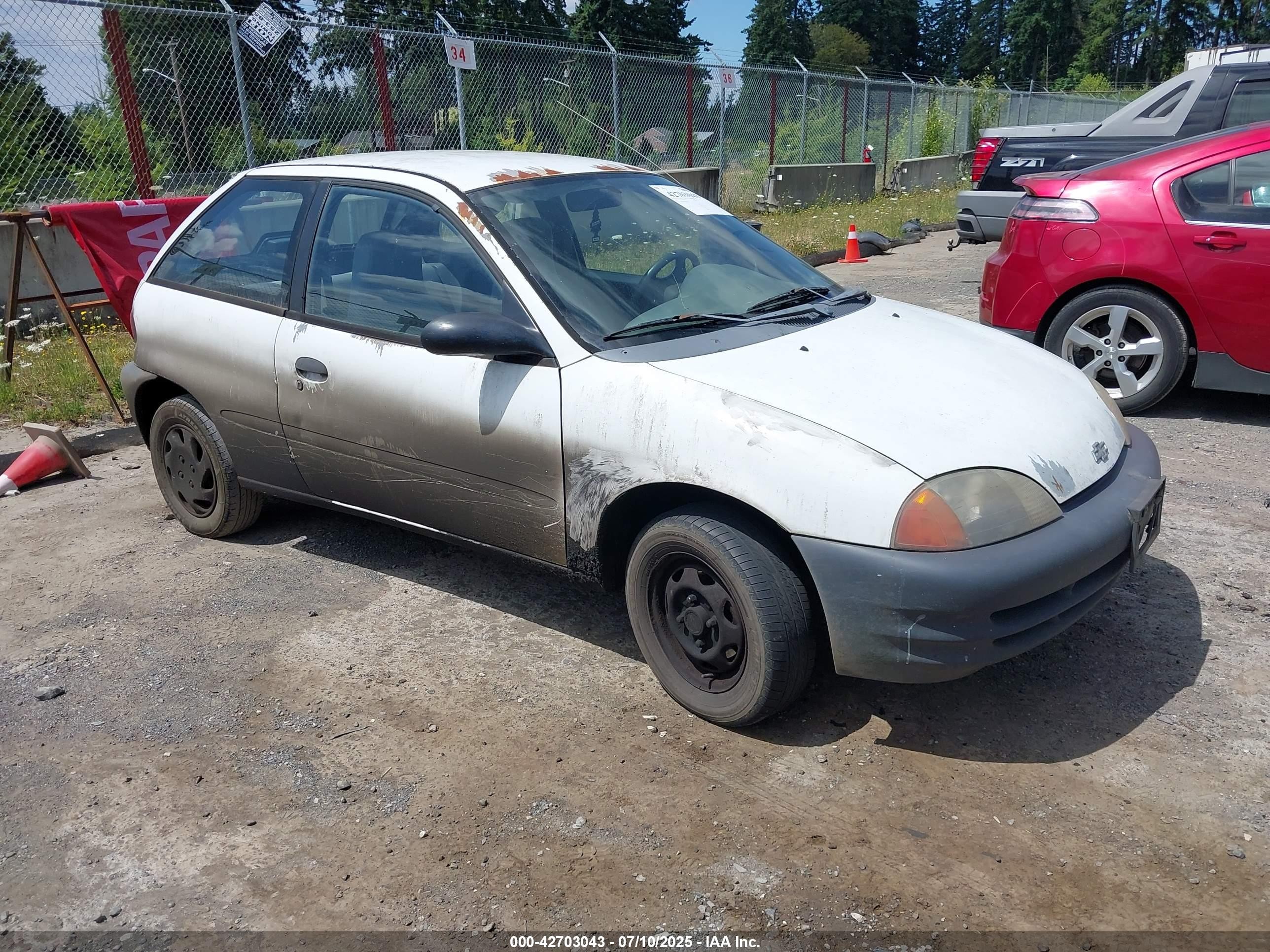 1998 Chevrolet Metro   White vin: 2C1MR2264W6726333