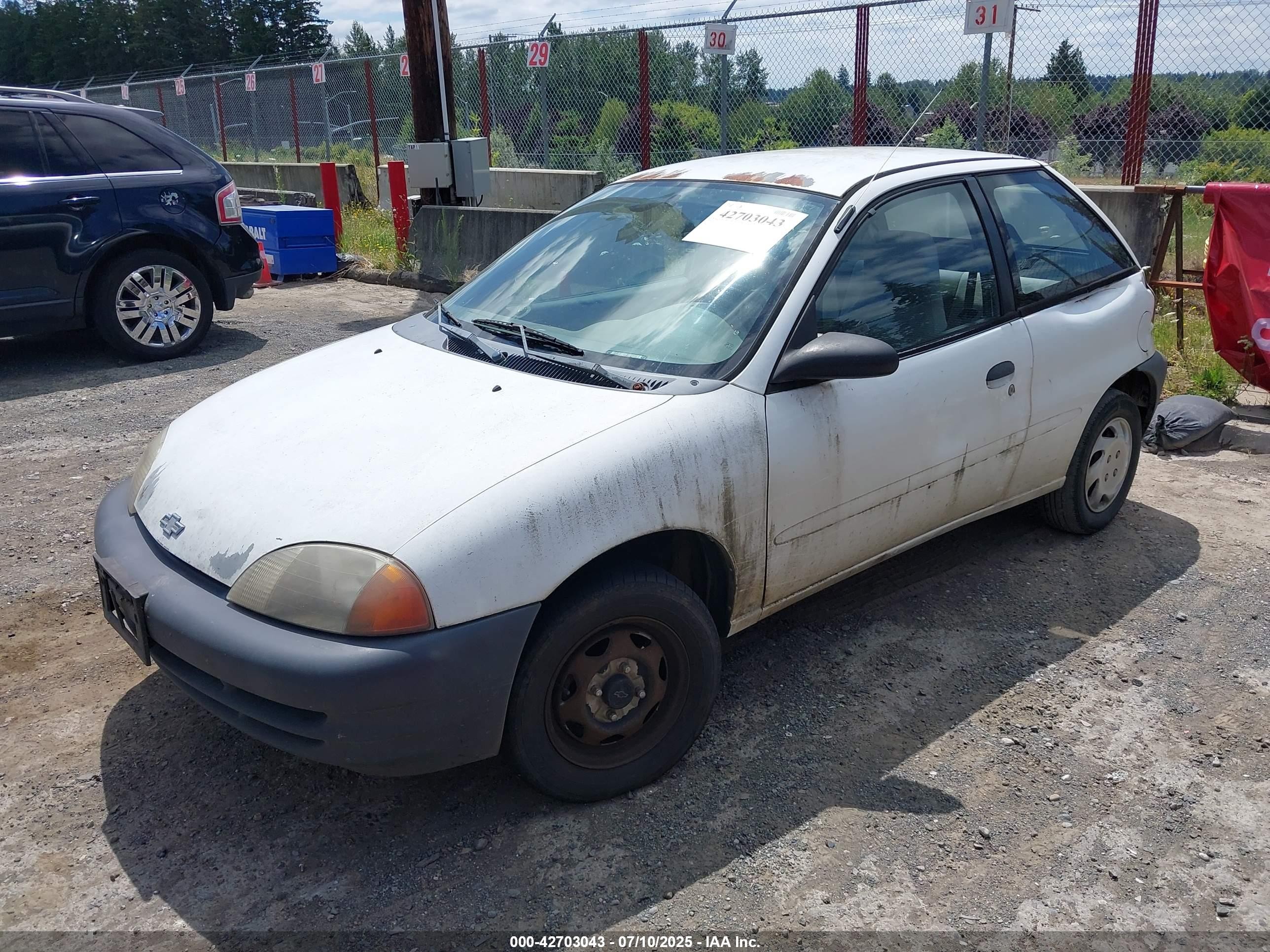 1998 Chevrolet Metro   White vin: 2C1MR2264W6726333
