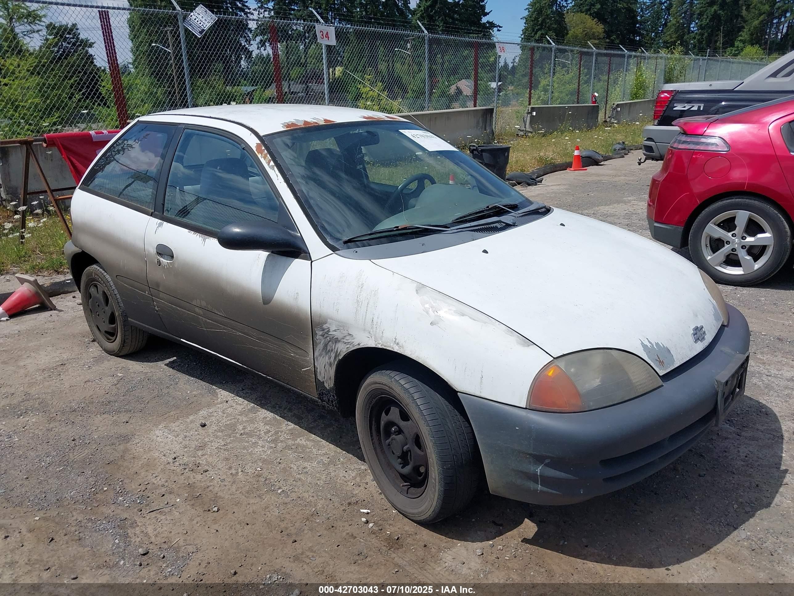 1998 Chevrolet Metro   White vin: 2C1MR2264W6726333