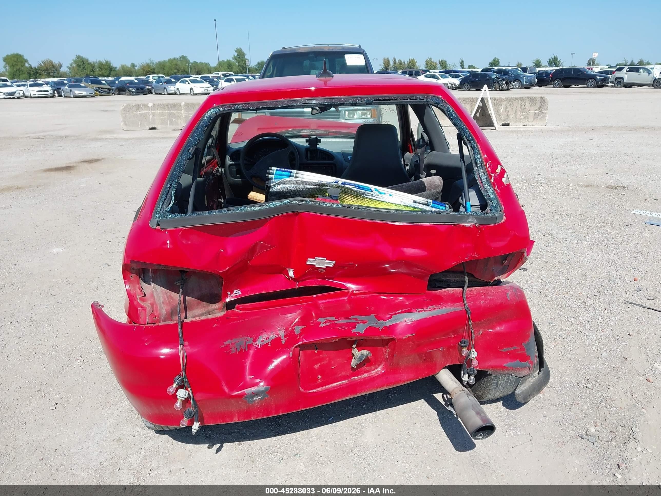 1998 Chevrolet Metro   Red vin: 2C1MR2265W6703174