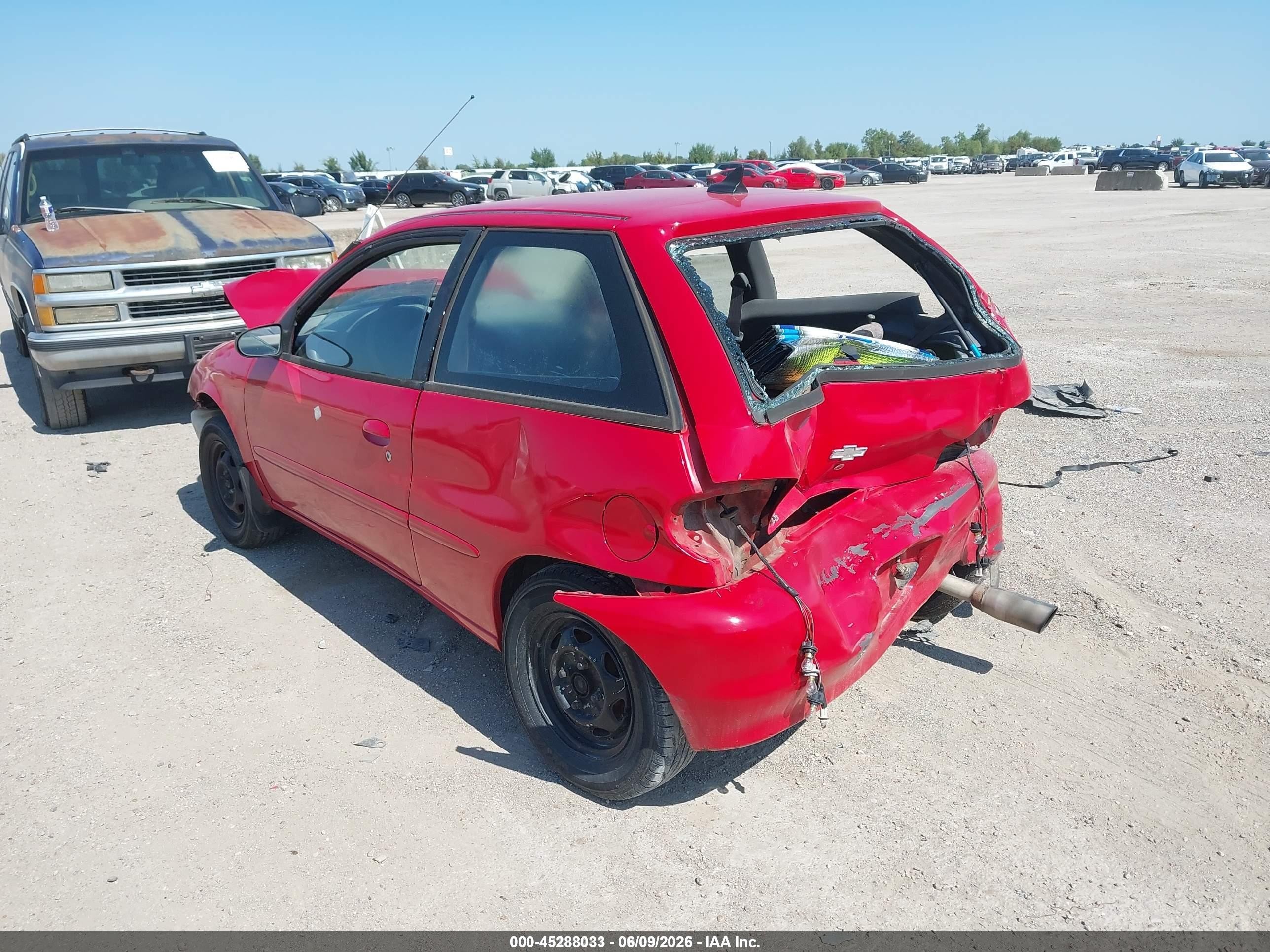 1998 Chevrolet Metro   Red vin: 2C1MR2265W6703174