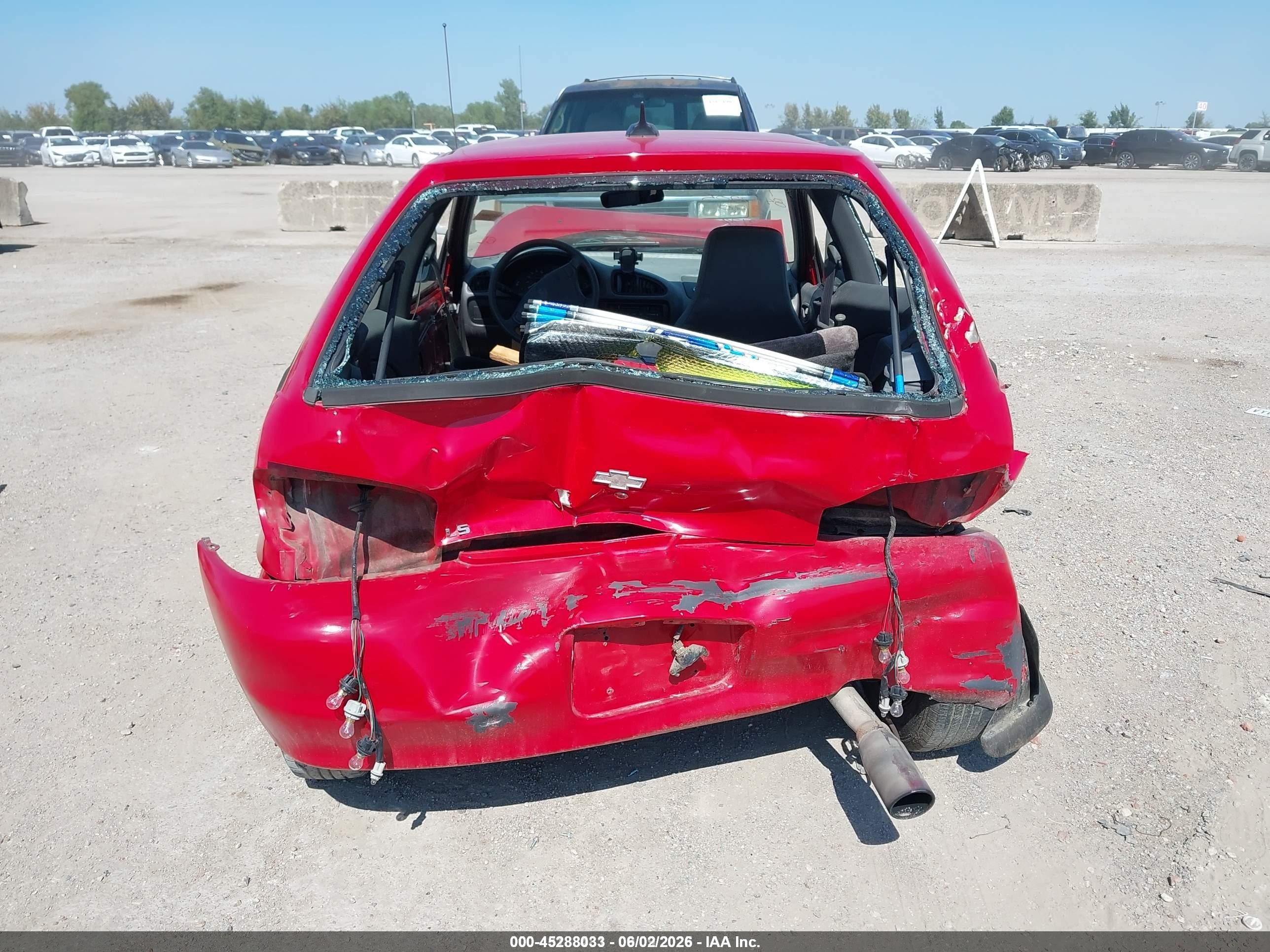 1998 Chevrolet Metro   Red vin: 2C1MR2265W6703174