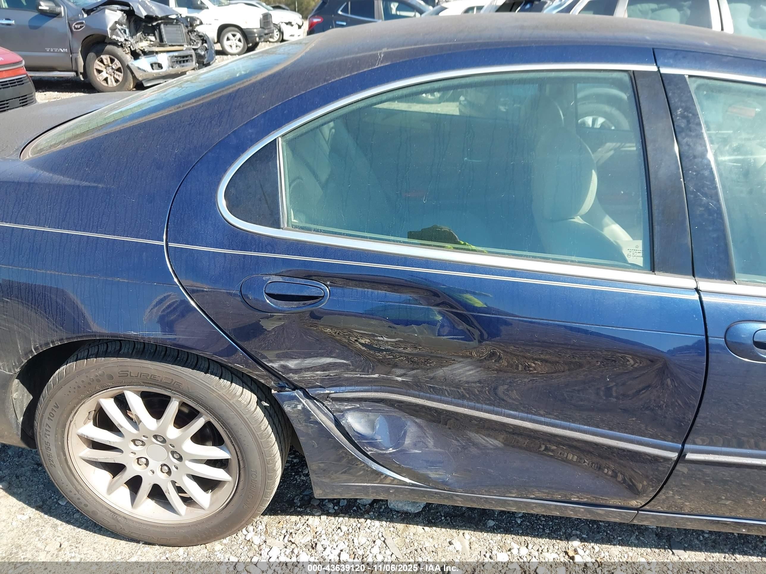 2004 Chrysler 300m   Blue vin: 2C3AE66G44H684862