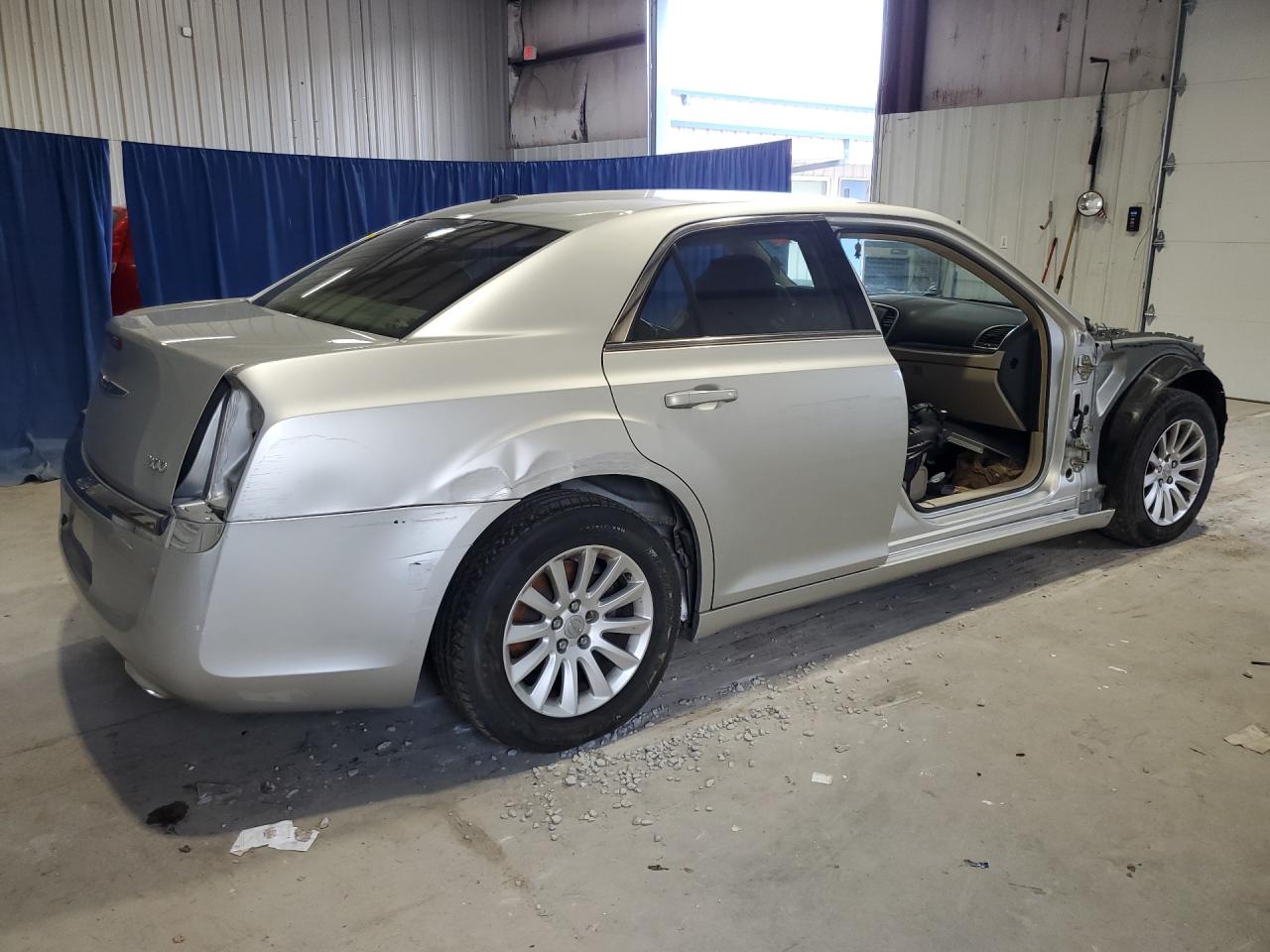 2012 Chrysler 300 Silver vin: 2C3CCAAG1CH289268 Damage: Rear Bumper/Cover, Scraped, > 12 Inches